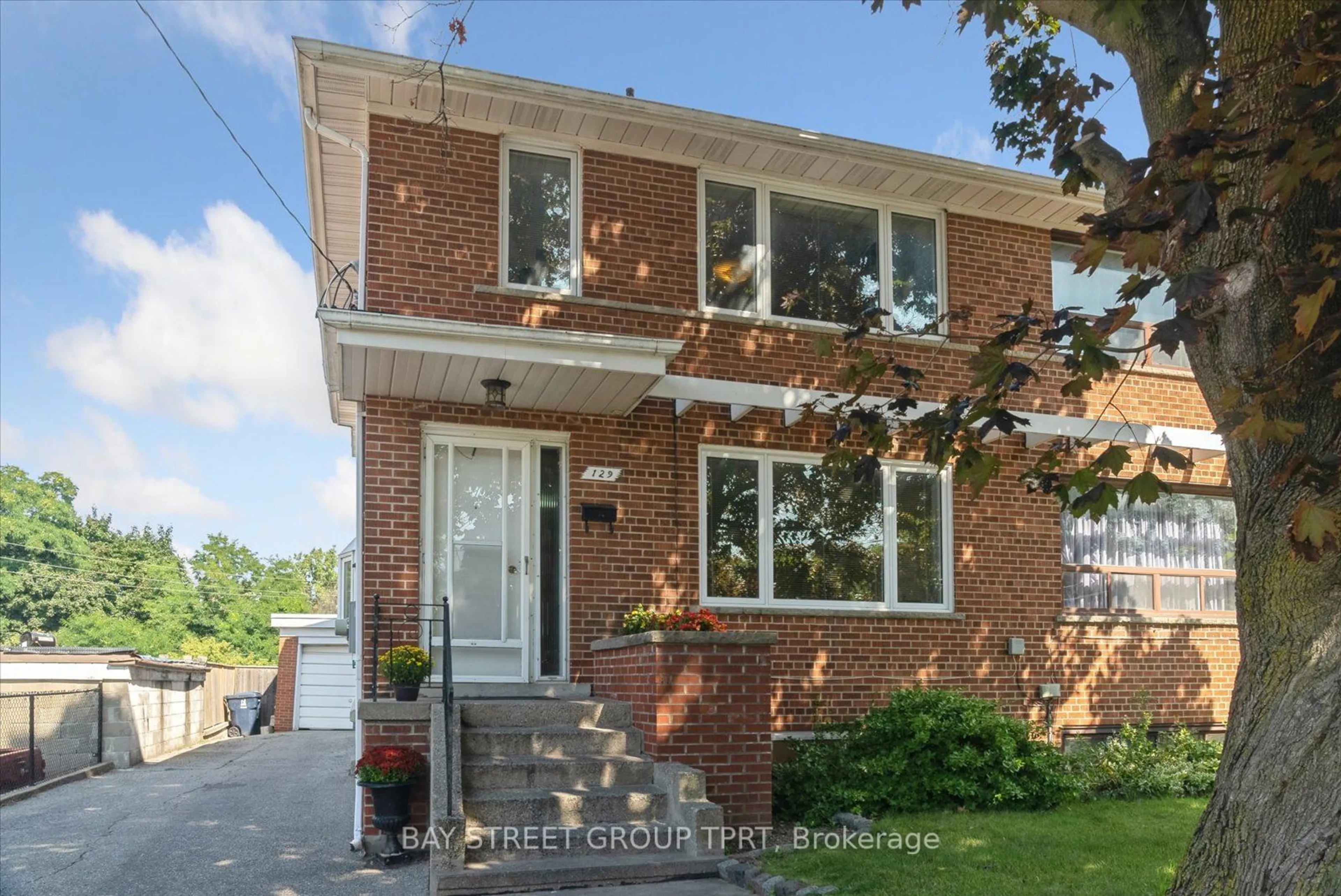 Home with brick exterior material for 129 Brookhaven Dr, Toronto Ontario M6M 4P1