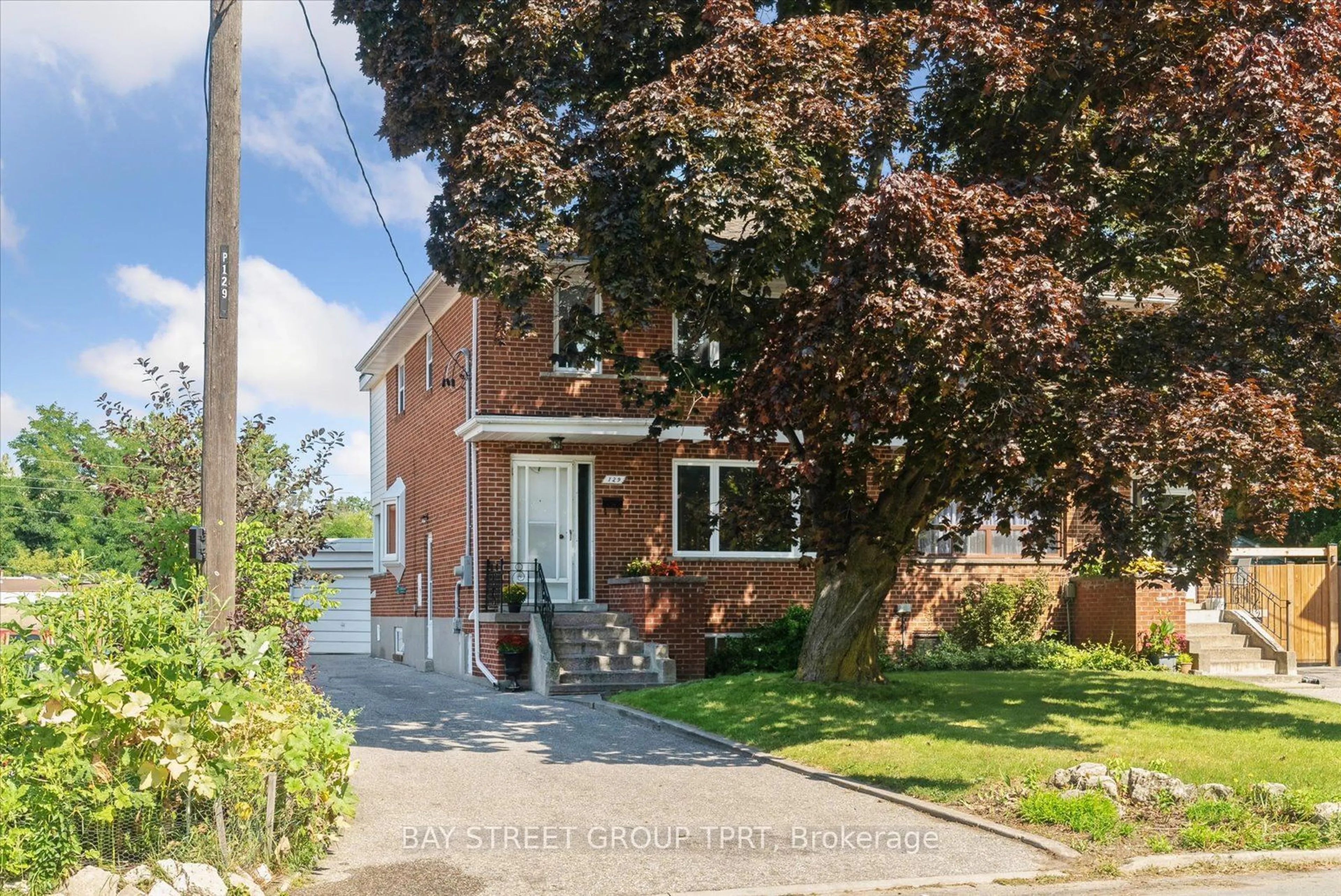 Frontside or backside of a home, the street view for 129 Brookhaven Dr, Toronto Ontario M6M 4P1