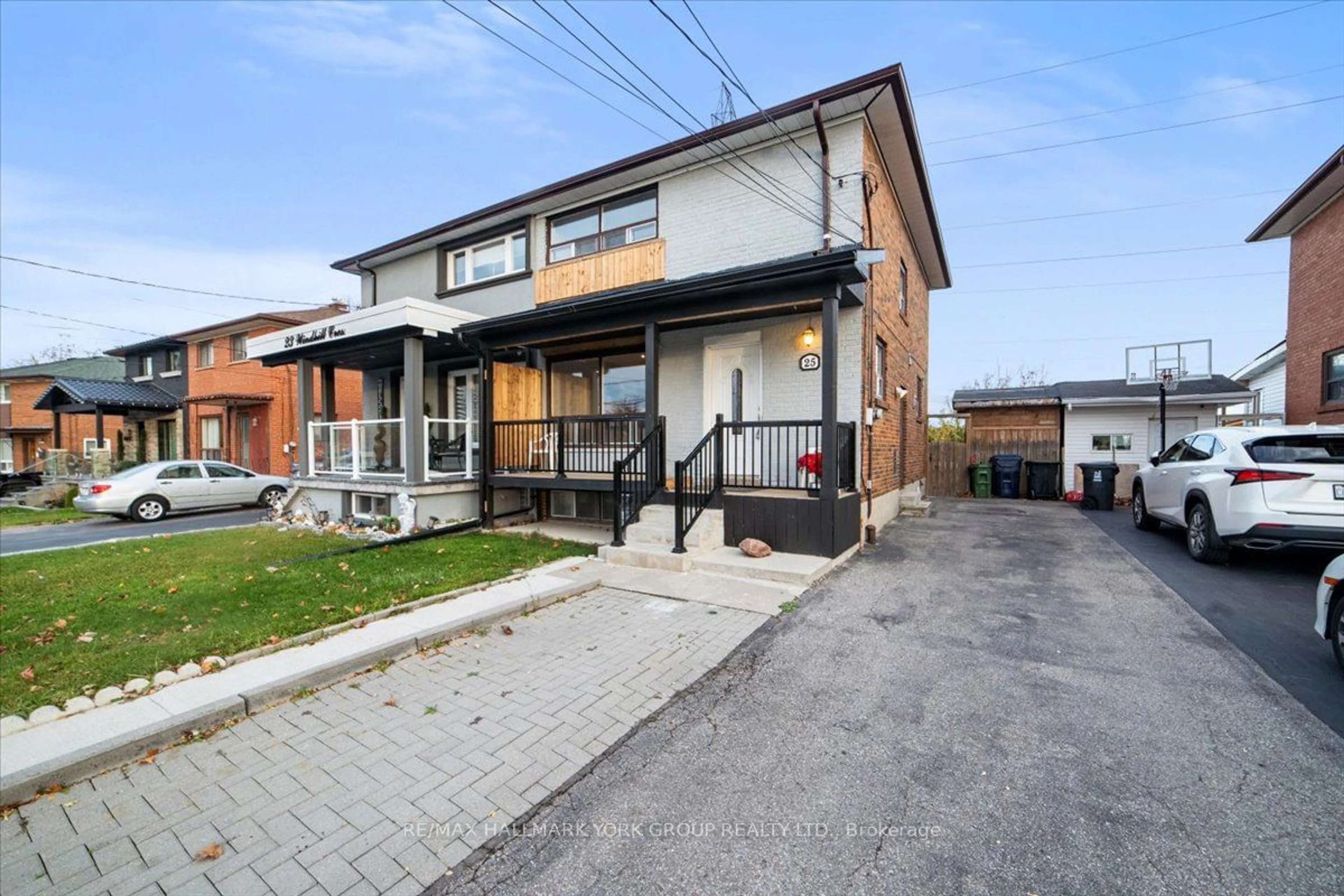 A pic from exterior of the house or condo, the street view for 25 Windhill Cres, Toronto Ontario M9M 1Y1