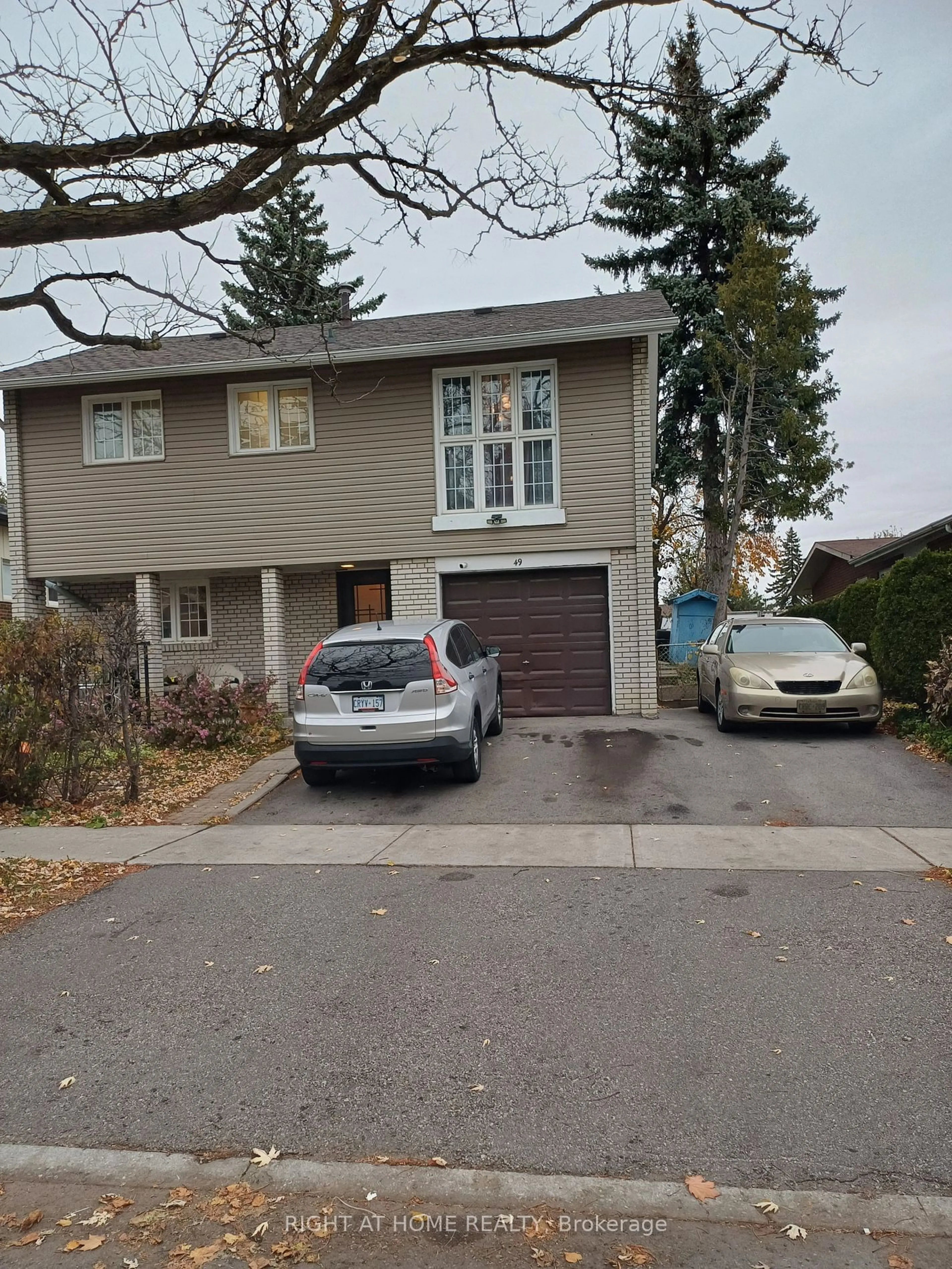 A pic from exterior of the house or condo, the street view for 49 Orpington Cres, Toronto Ontario M9V 3E2