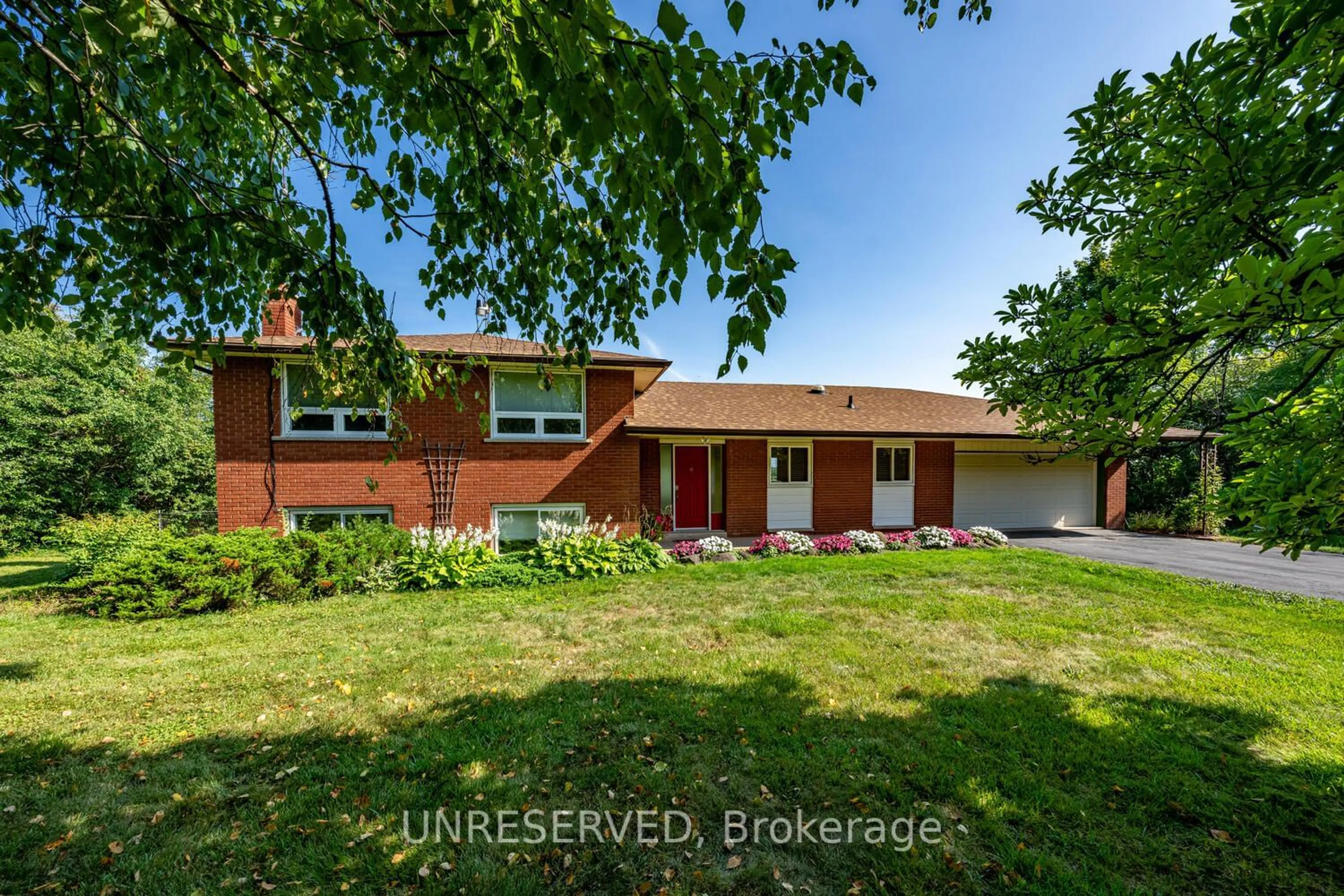 Frontside or backside of a home, the fenced backyard for 13074 Fallbrook Tr, Halton Hills Ontario L7G 4S8