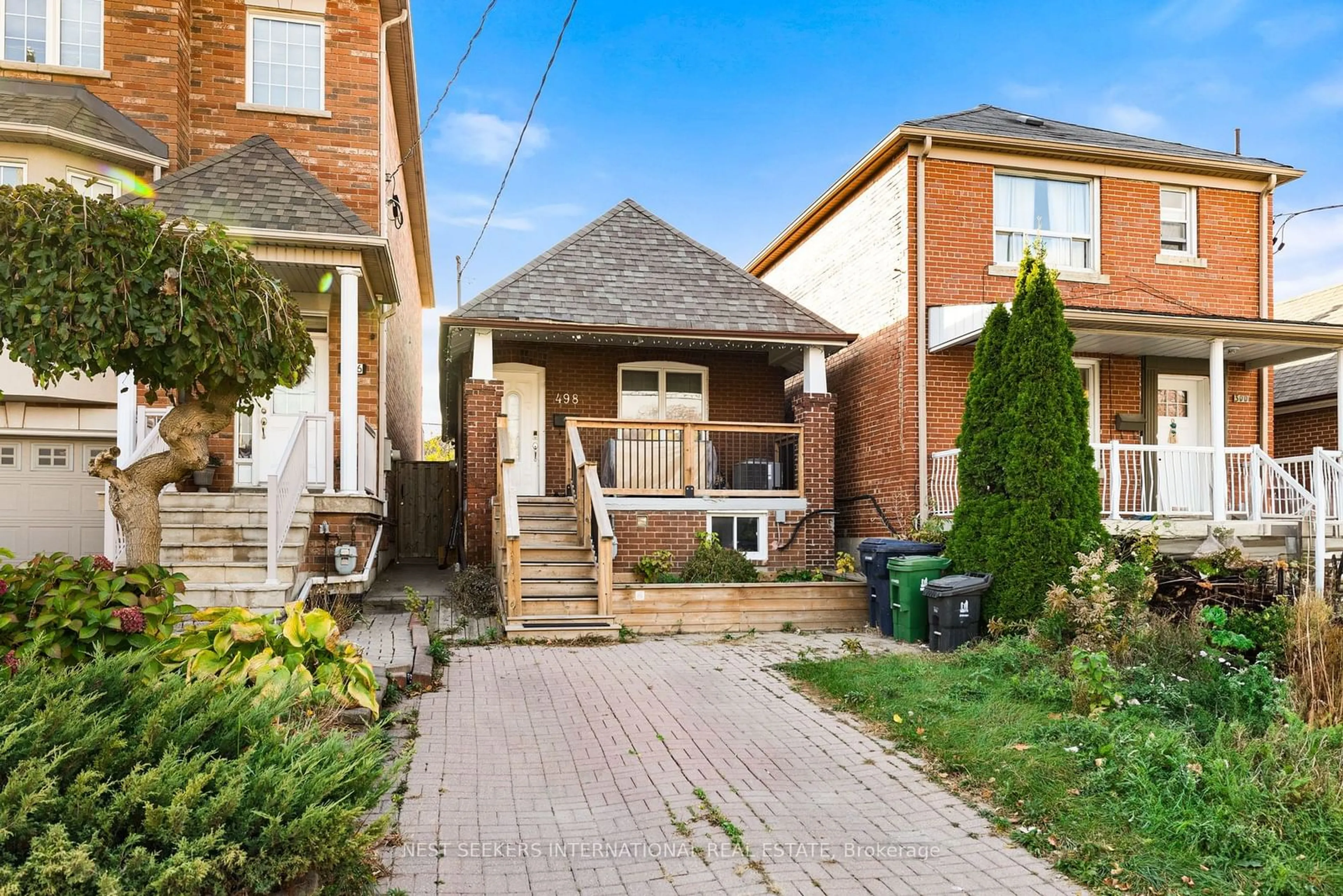 Frontside or backside of a home, the street view for 498 Caledonia Rd, Toronto Ontario M6E 4V2