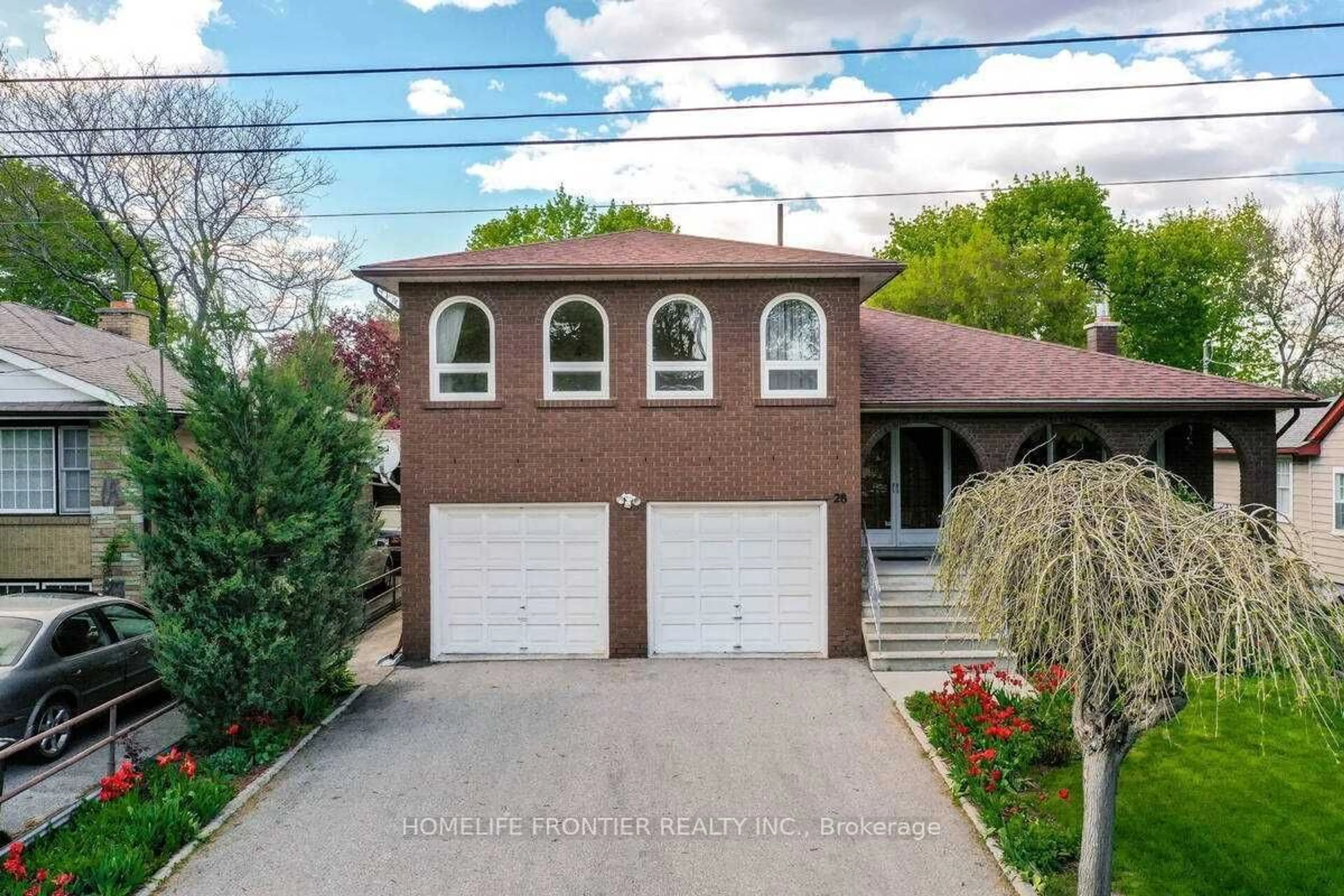 Frontside or backside of a home, the street view for 28 Barker Ave, Toronto Ontario M9V 1E5