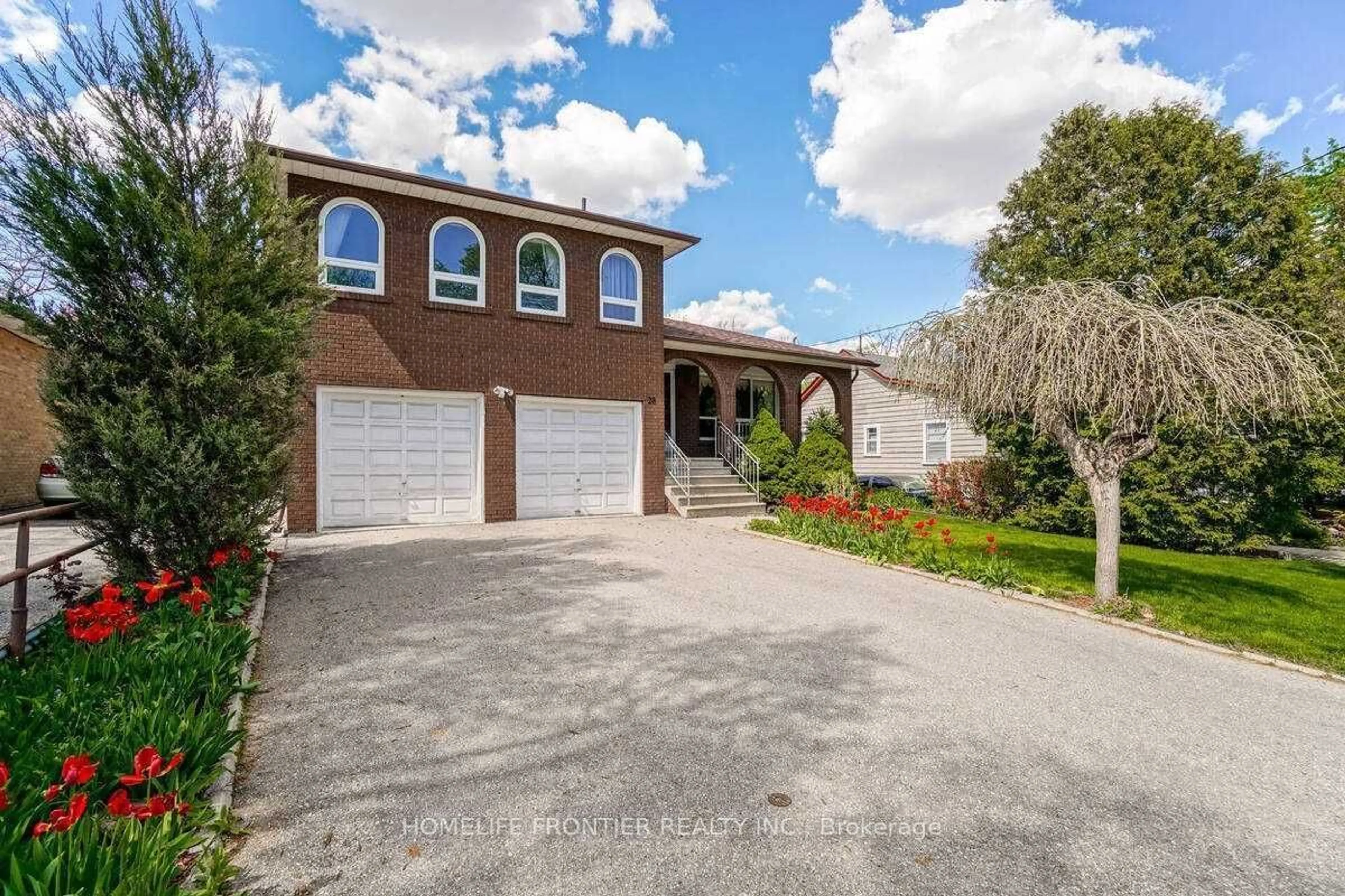 Frontside or backside of a home, the street view for 28 Barker Ave, Toronto Ontario M9V 1E5