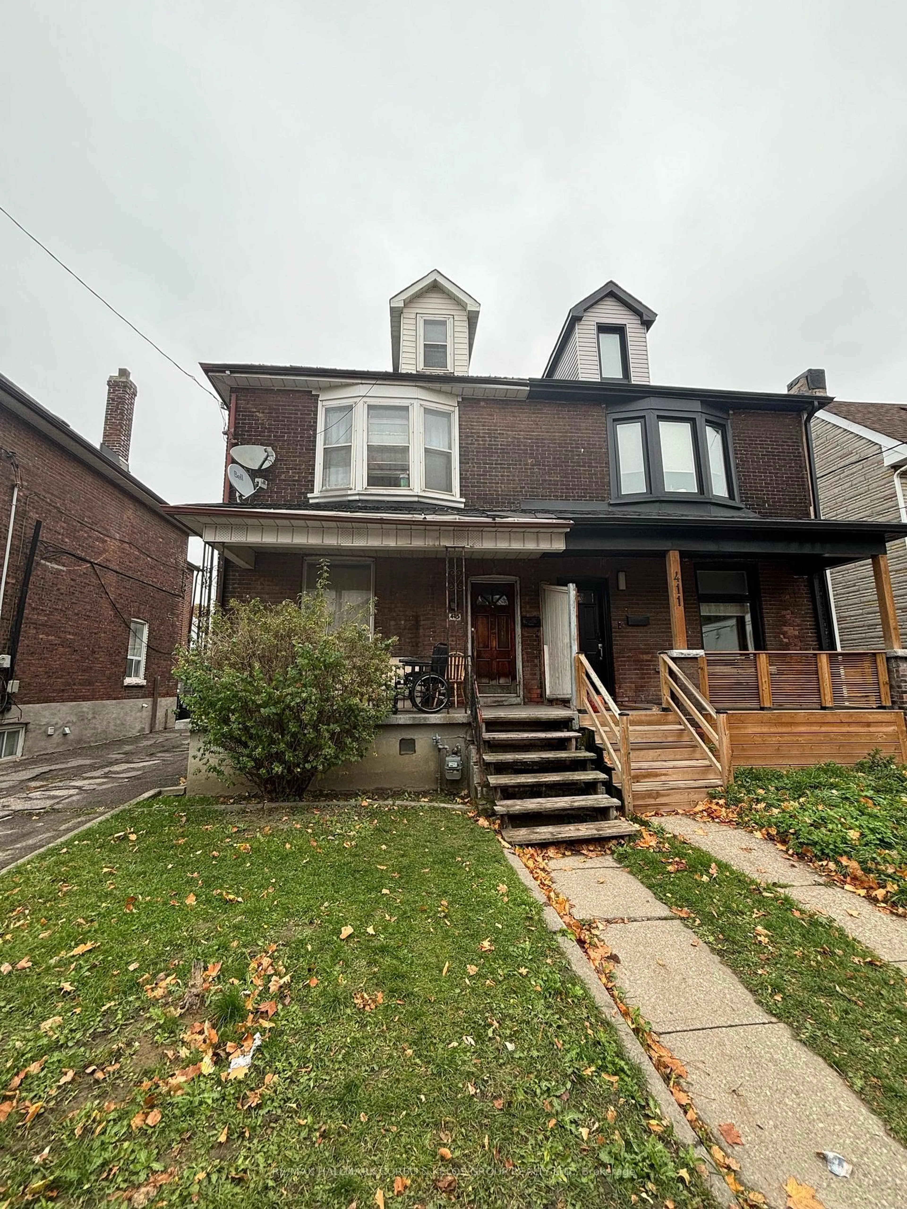 Frontside or backside of a home, the front or back of building for 415 Symington Ave, Toronto Ontario M6N 2W4