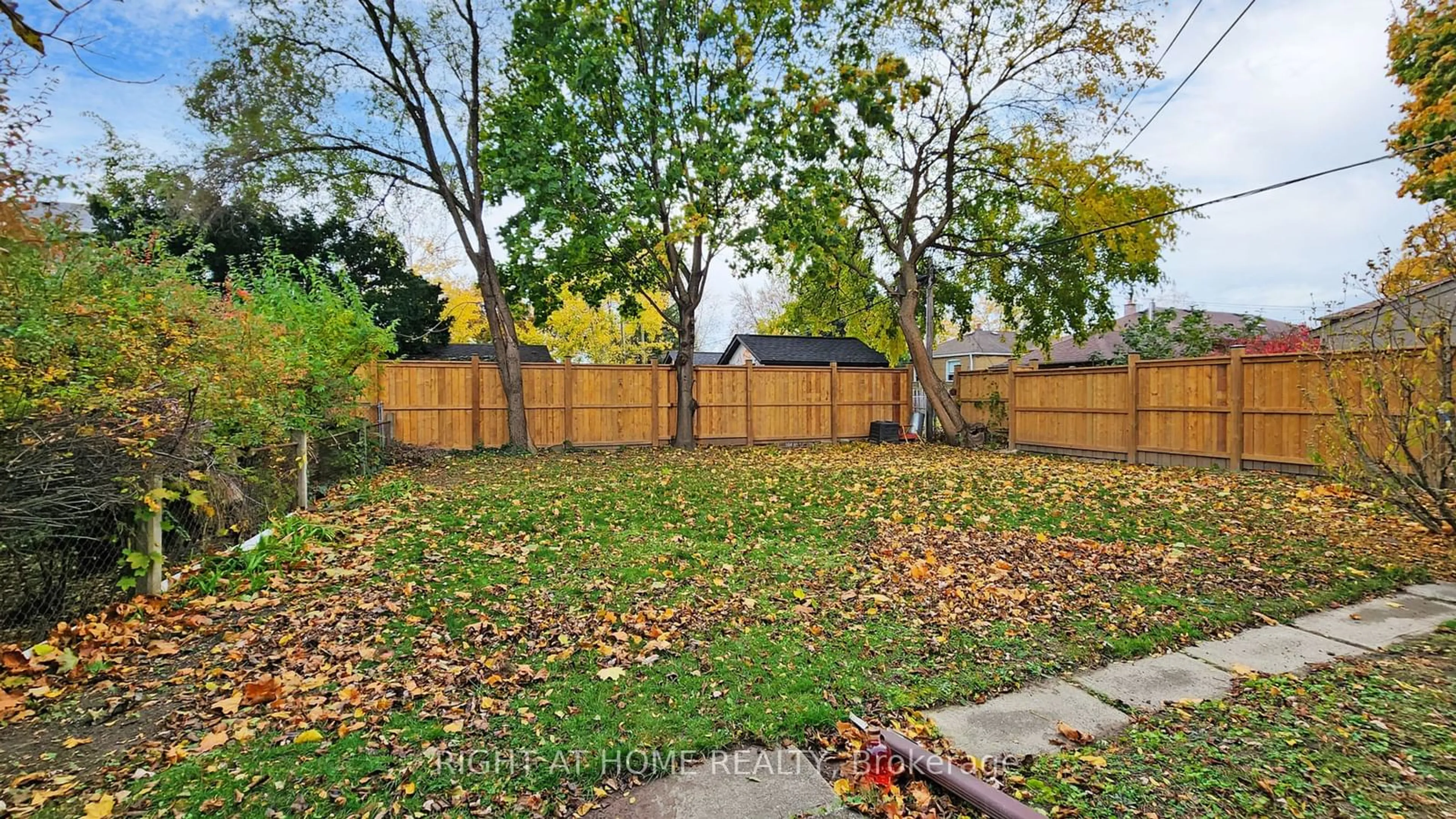 Patio, the fenced backyard for 17 Bisset Ave, Toronto Ontario M8W 2S9