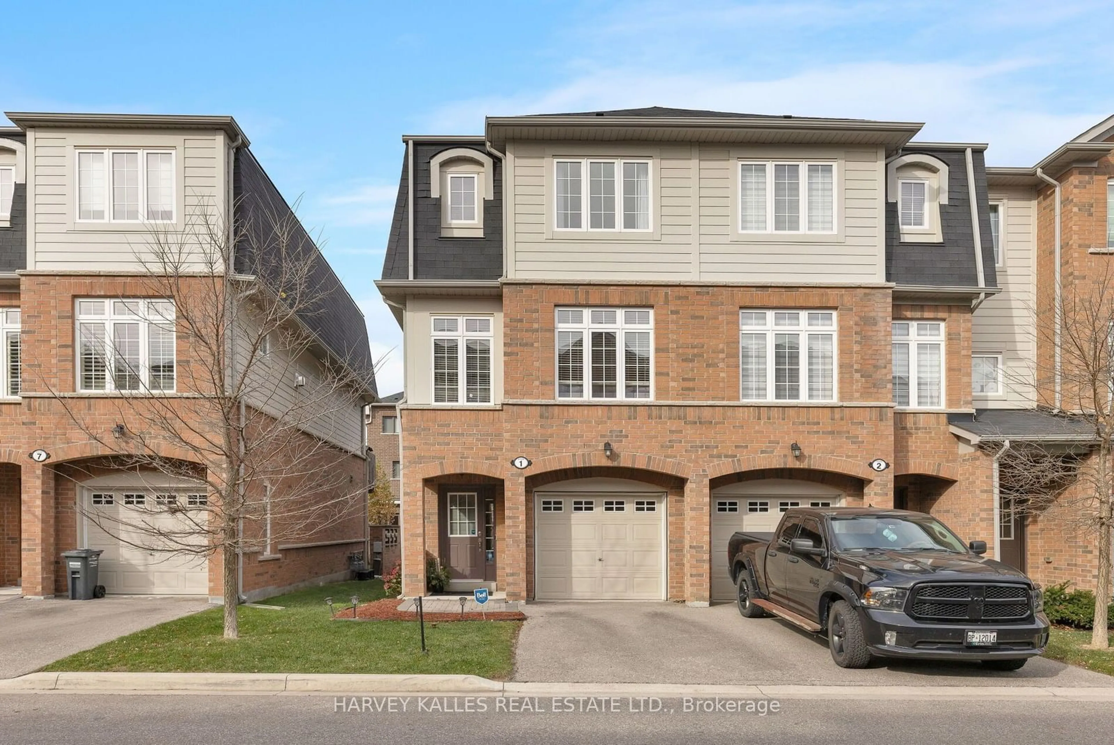 A pic from exterior of the house or condo, the street view for 1131 Haig Blvd #1, Mississauga Ontario L5E 2M6