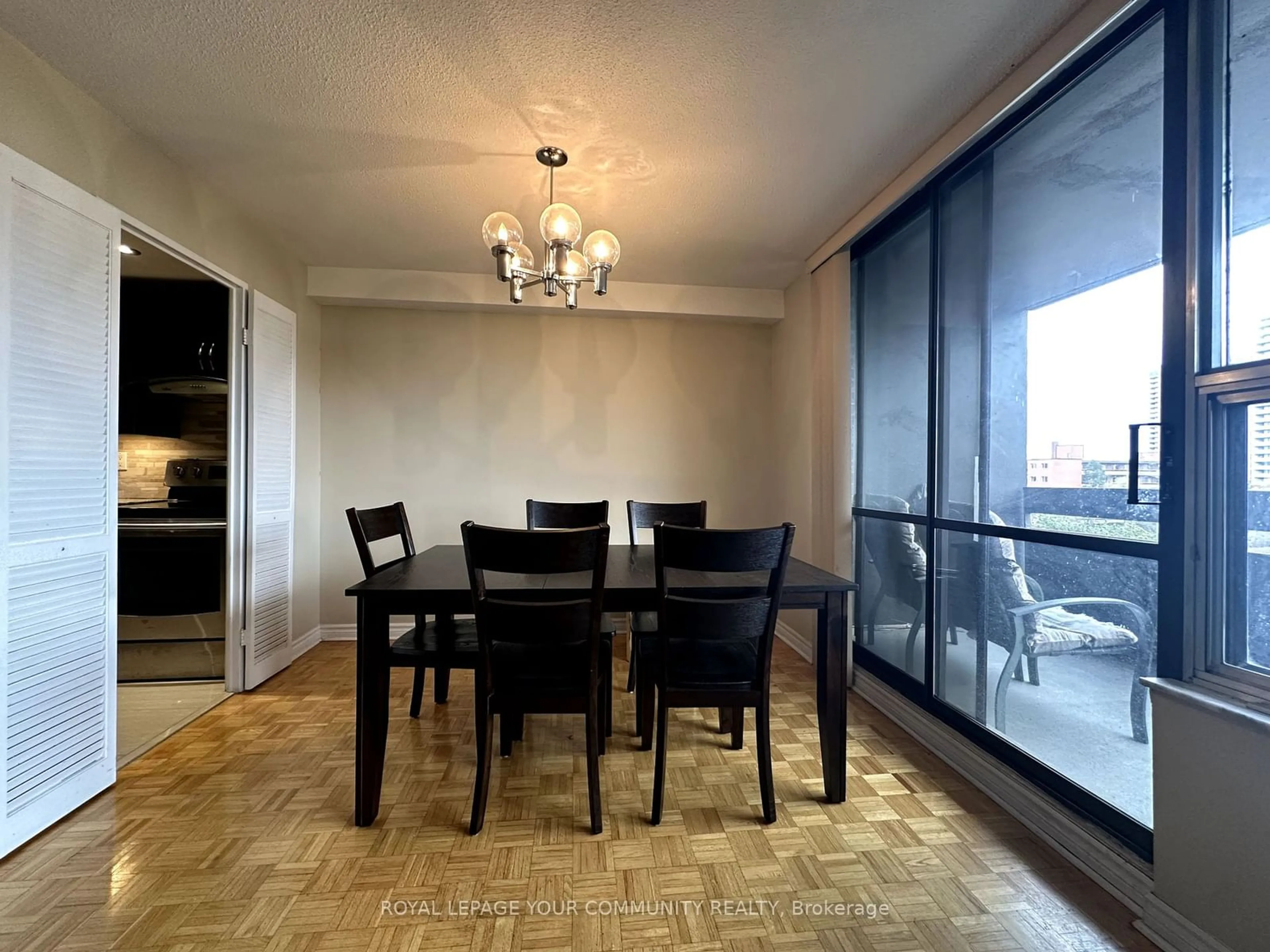 Dining room, wood floors for 11 Wincott Dr #611, Toronto Ontario M9R 2R9