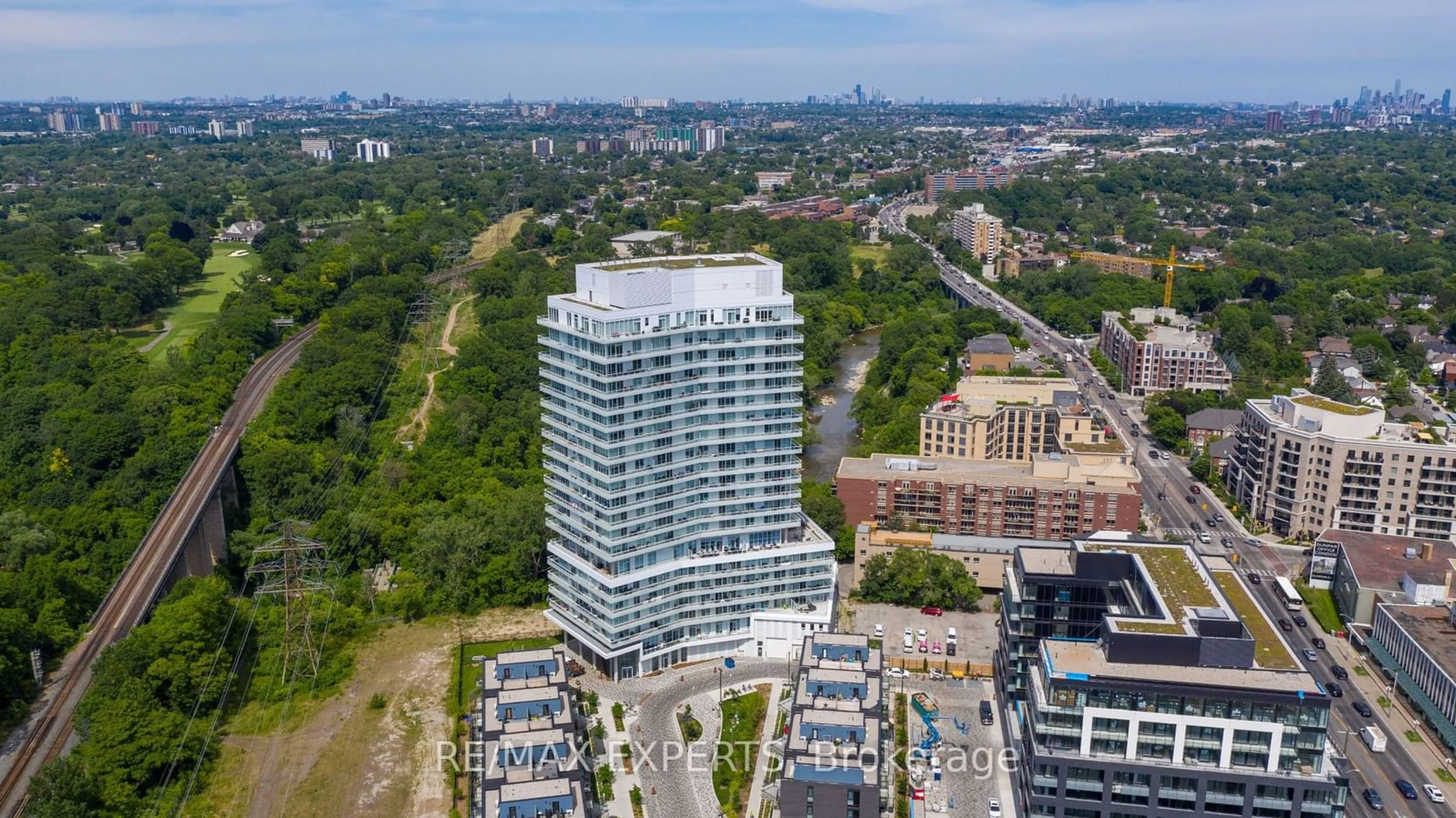 A pic from exterior of the house or condo, the view of city buildings for 20 Brin Dr #510, Toronto Ontario M8X 0B2