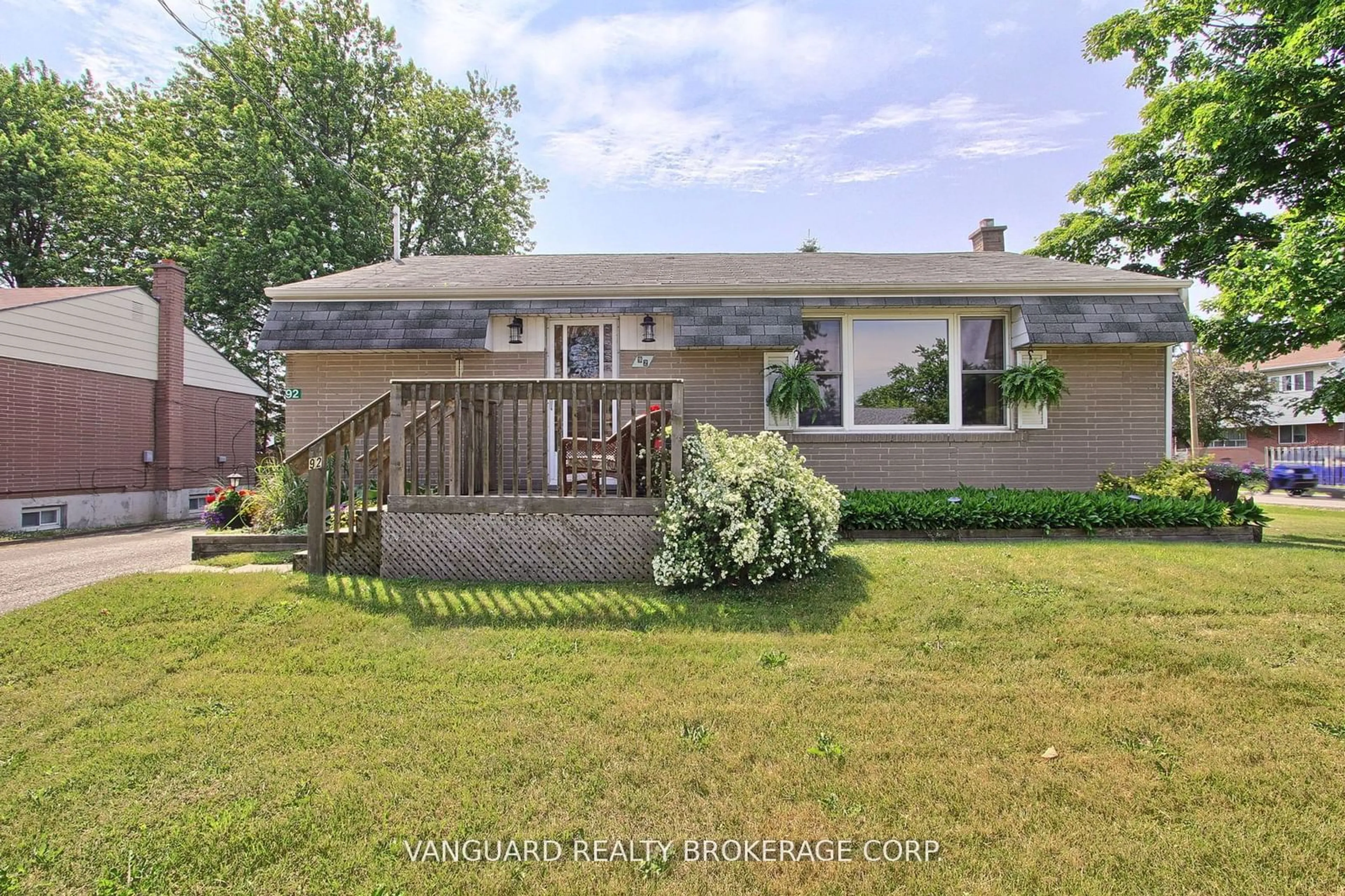 Frontside or backside of a home, the fenced backyard for 92 Ellwood Dr, Caledon Ontario L7E 4W7