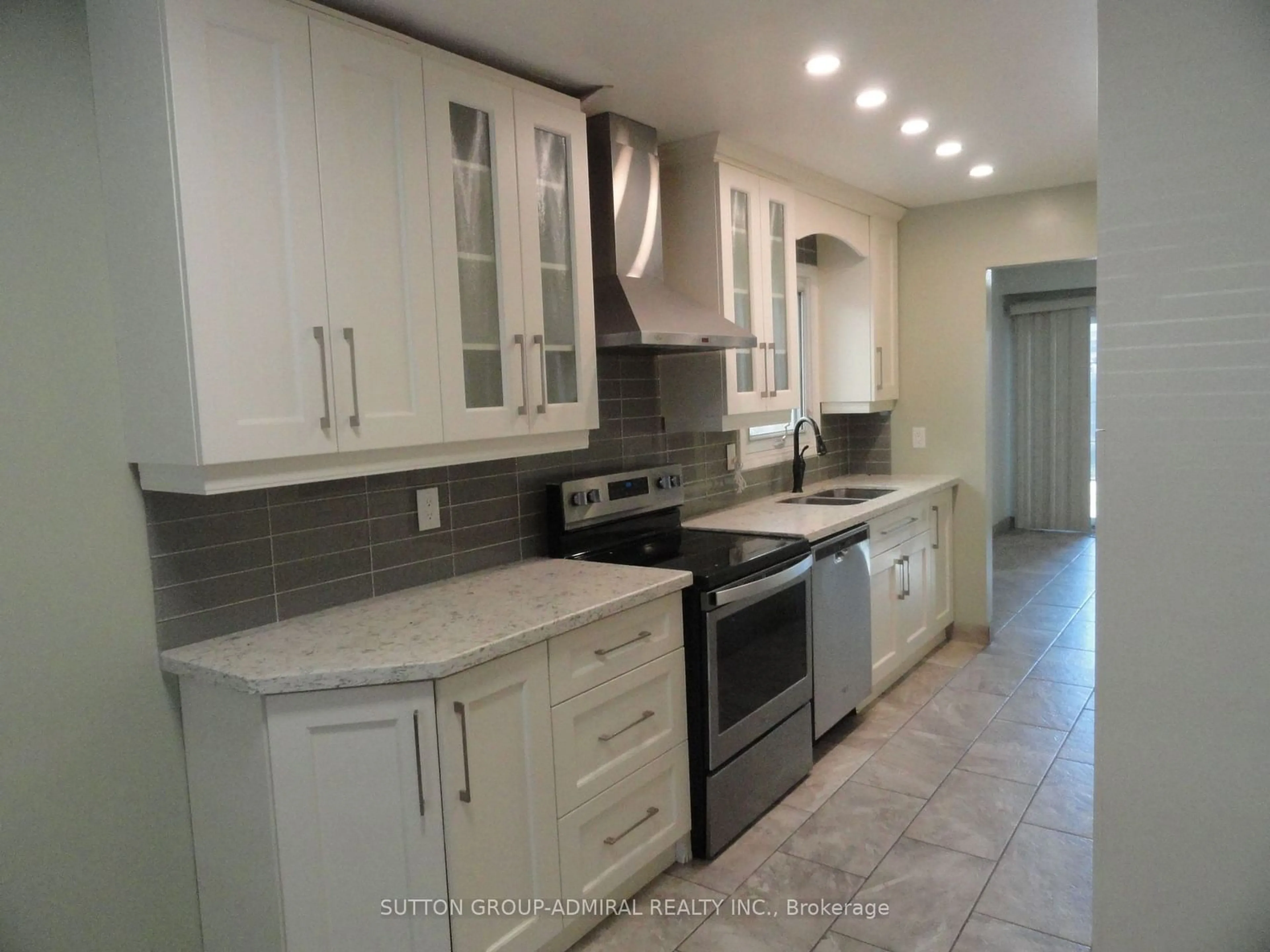 Open concept kitchen for 46 Lady Stewart Blvd, Brampton Ontario L6S 3Y3