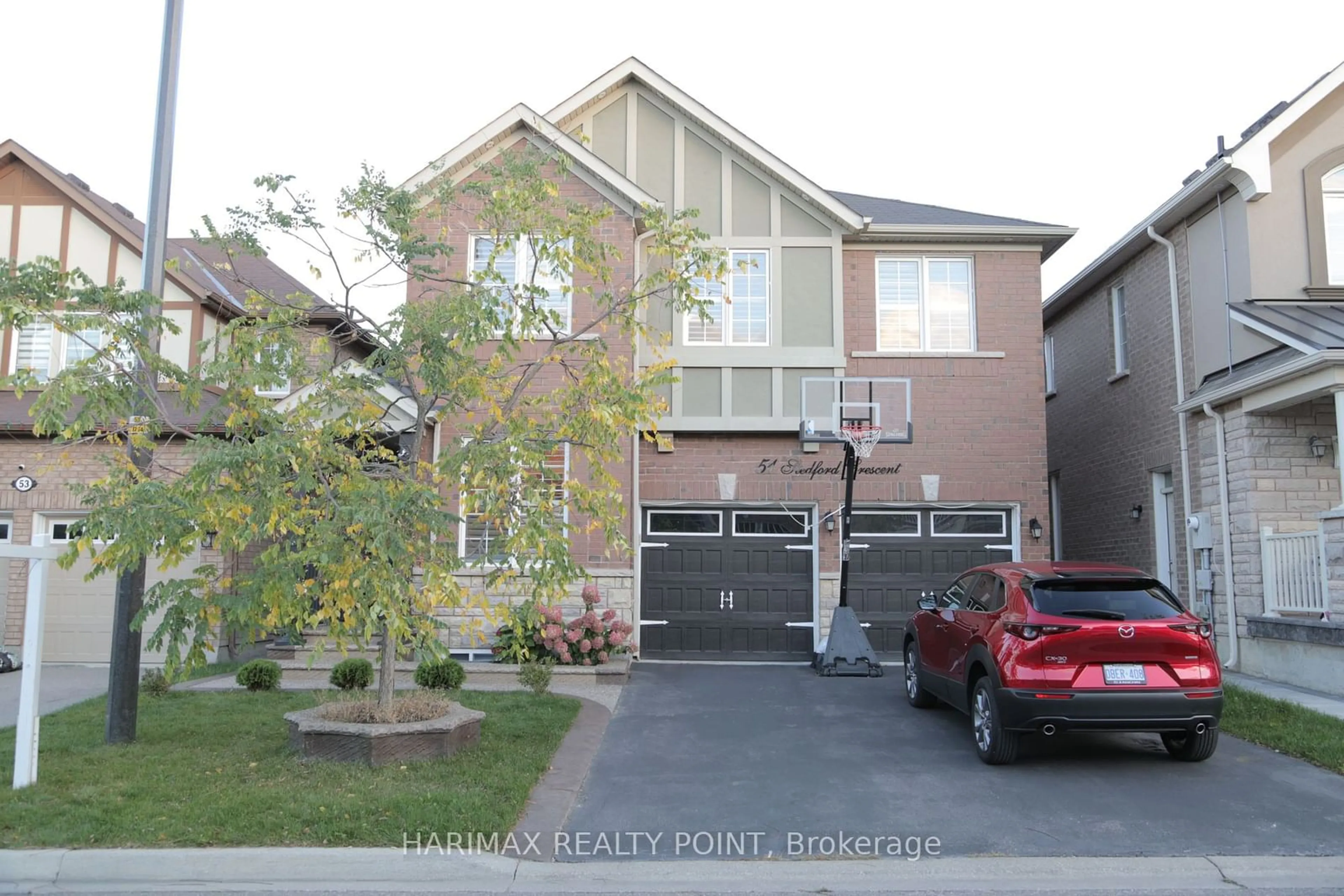 Frontside or backside of a home, the street view for 51 Stedford Cres, Brampton Ontario L7A 4P5