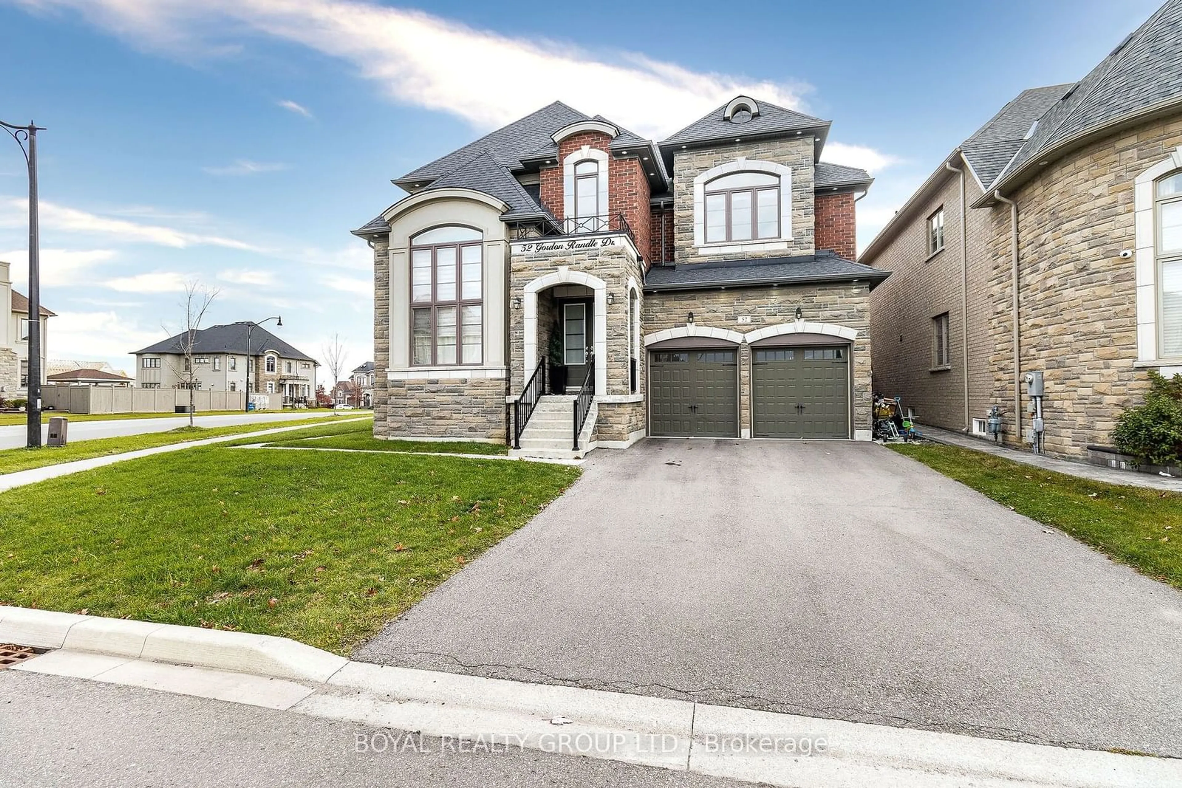 Frontside or backside of a home, the street view for 52 Gordon Randle Dr, Brampton Ontario L6P 4H8