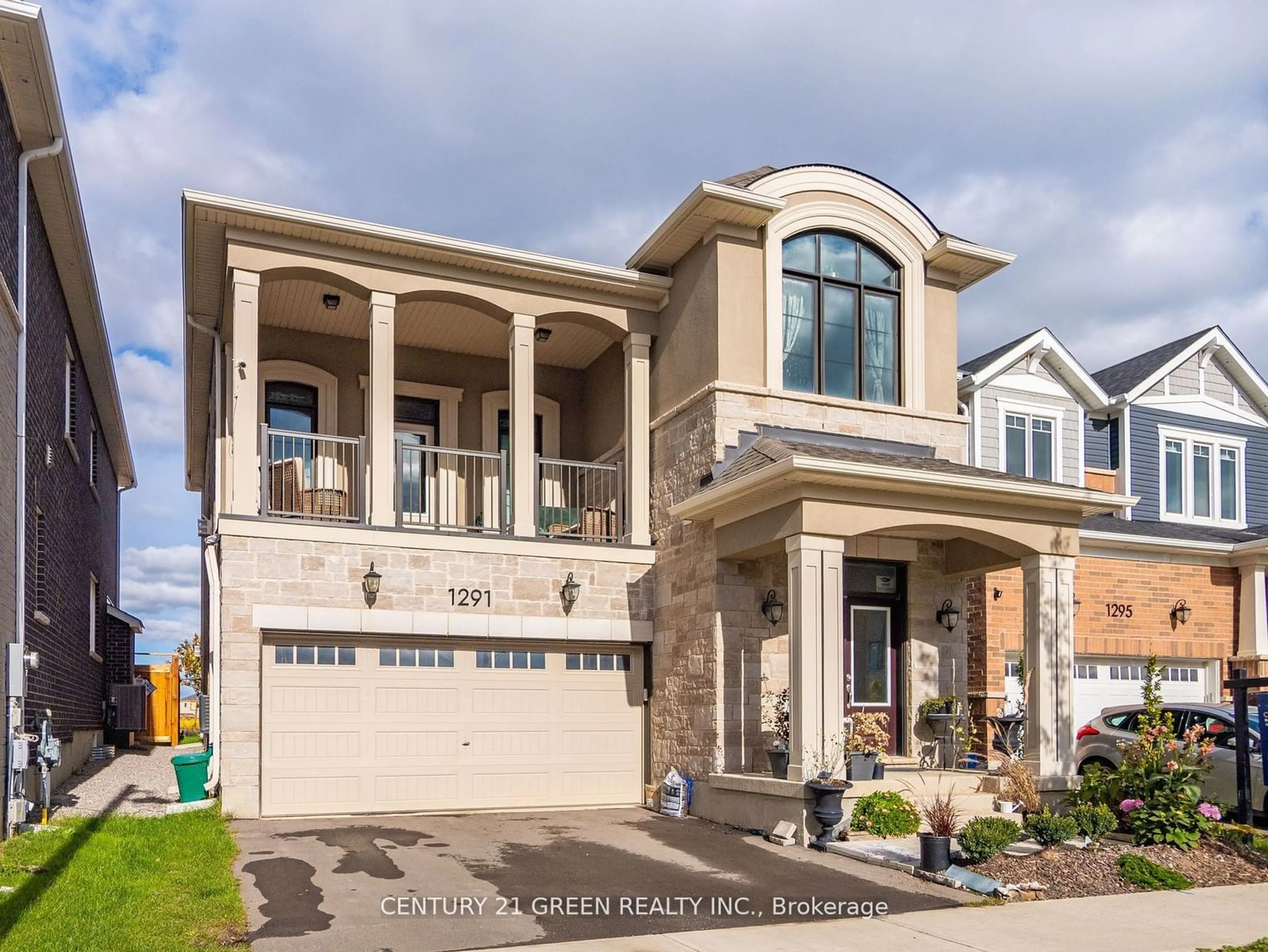 Frontside or backside of a home, the street view for 1291 Kovachik Blvd, Milton Ontario L9E 1W7