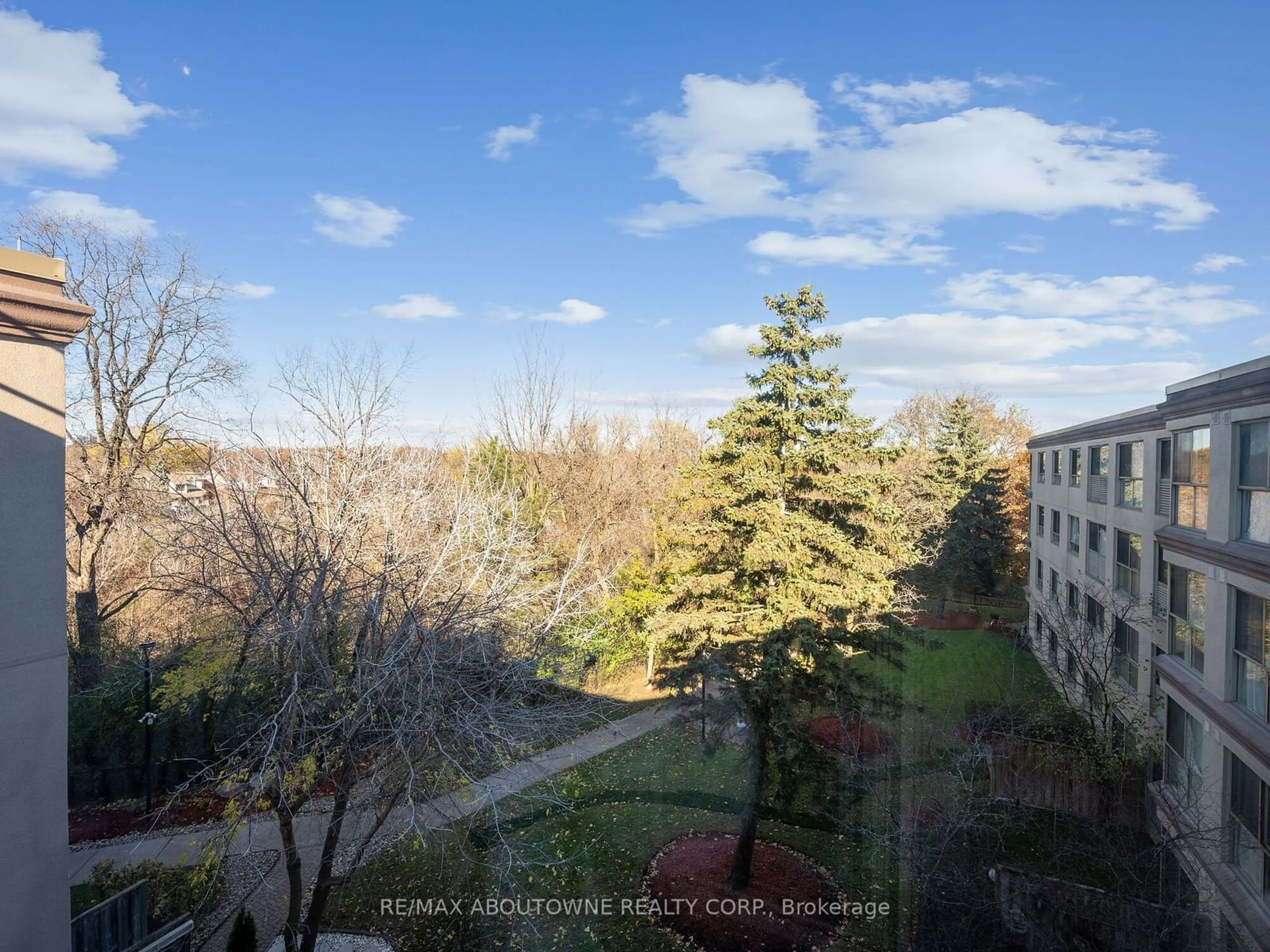 A pic from outside/outdoor area/front of a property/back of a property/a pic from drone, forest/trees view for 8351 Mclaughlin Rd #422, Brampton Ontario L6Y 4H8