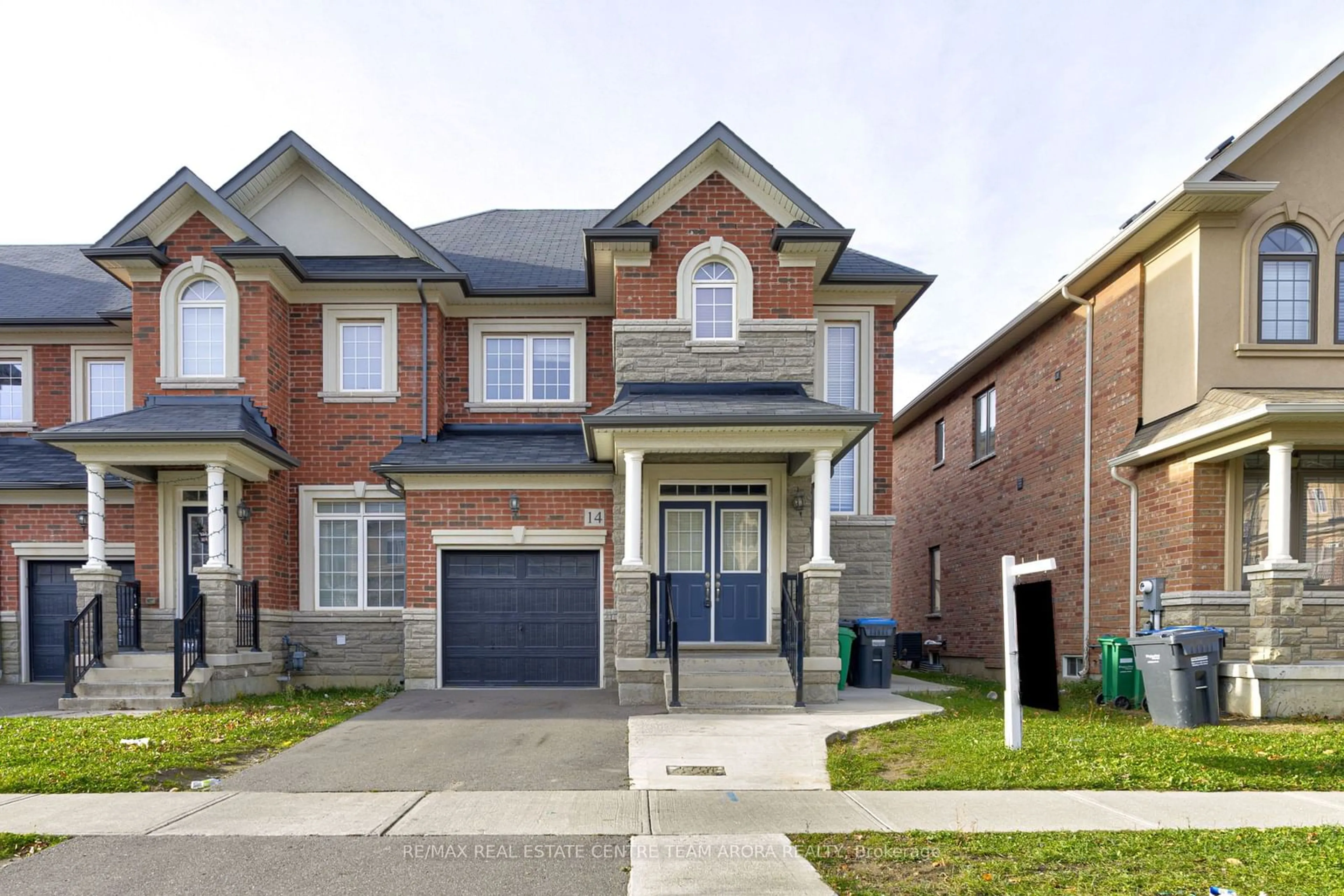 Home with brick exterior material for 14 Hines St, Brampton Ontario L7A 4X5