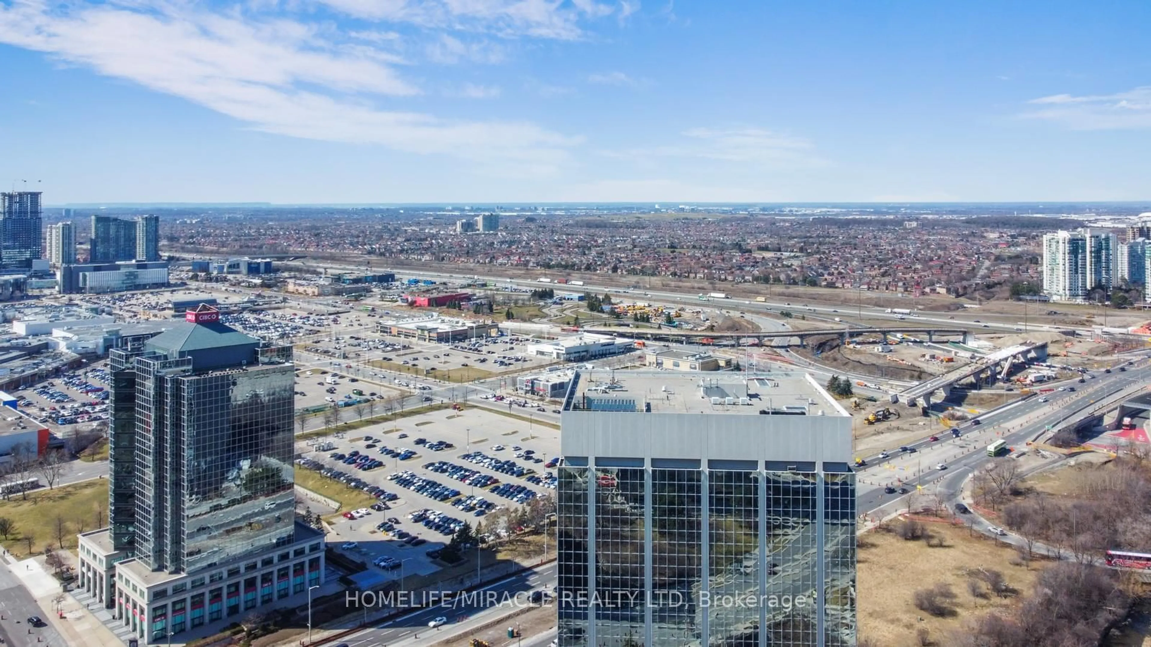 A pic from exterior of the house or condo, the view of city buildings for 80 Absolute Ave #3303, Mississauga Ontario L4Z 0A5