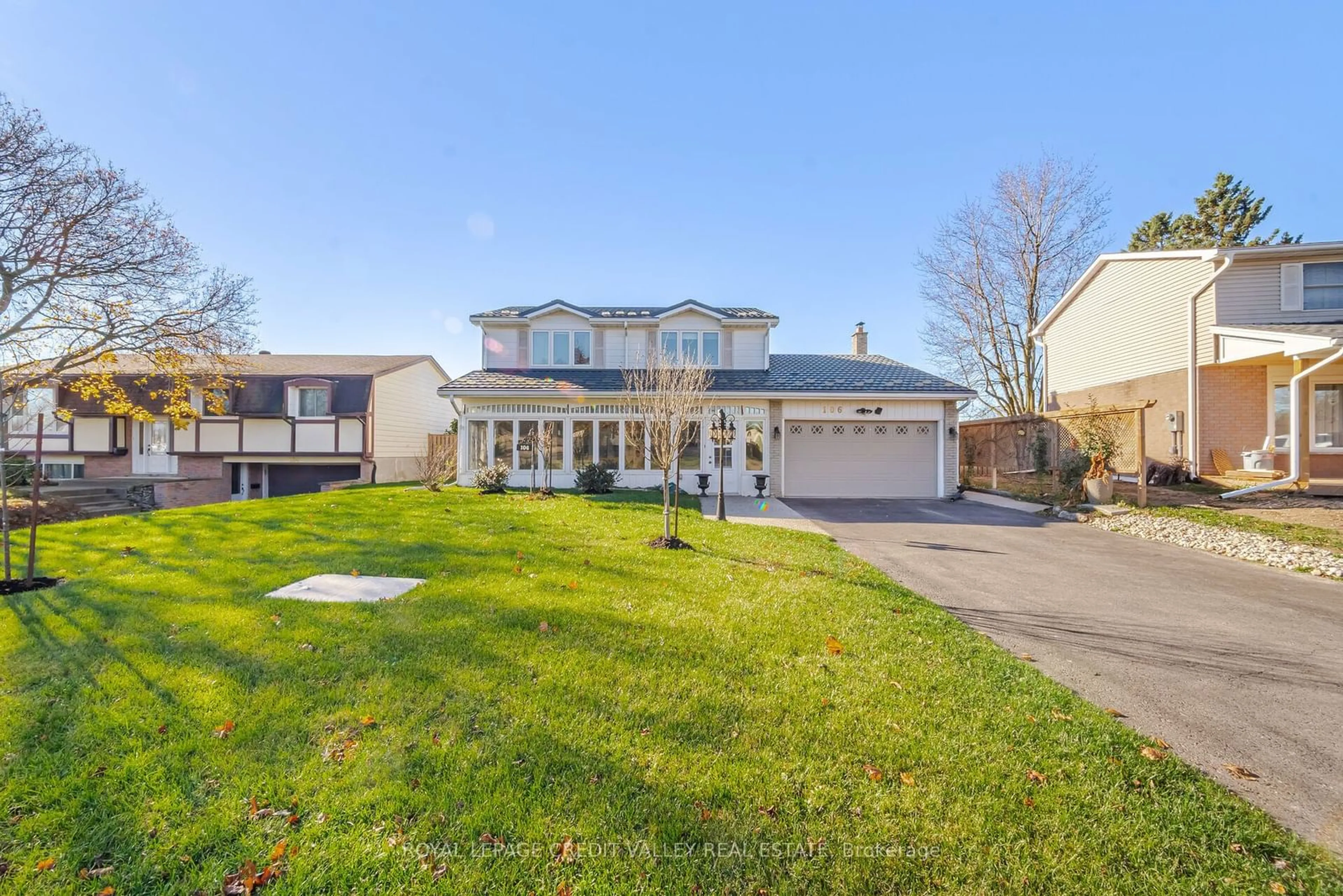 Frontside or backside of a home, the fenced backyard for 106 Acton Blvd, Halton Hills Ontario L7J 2H7