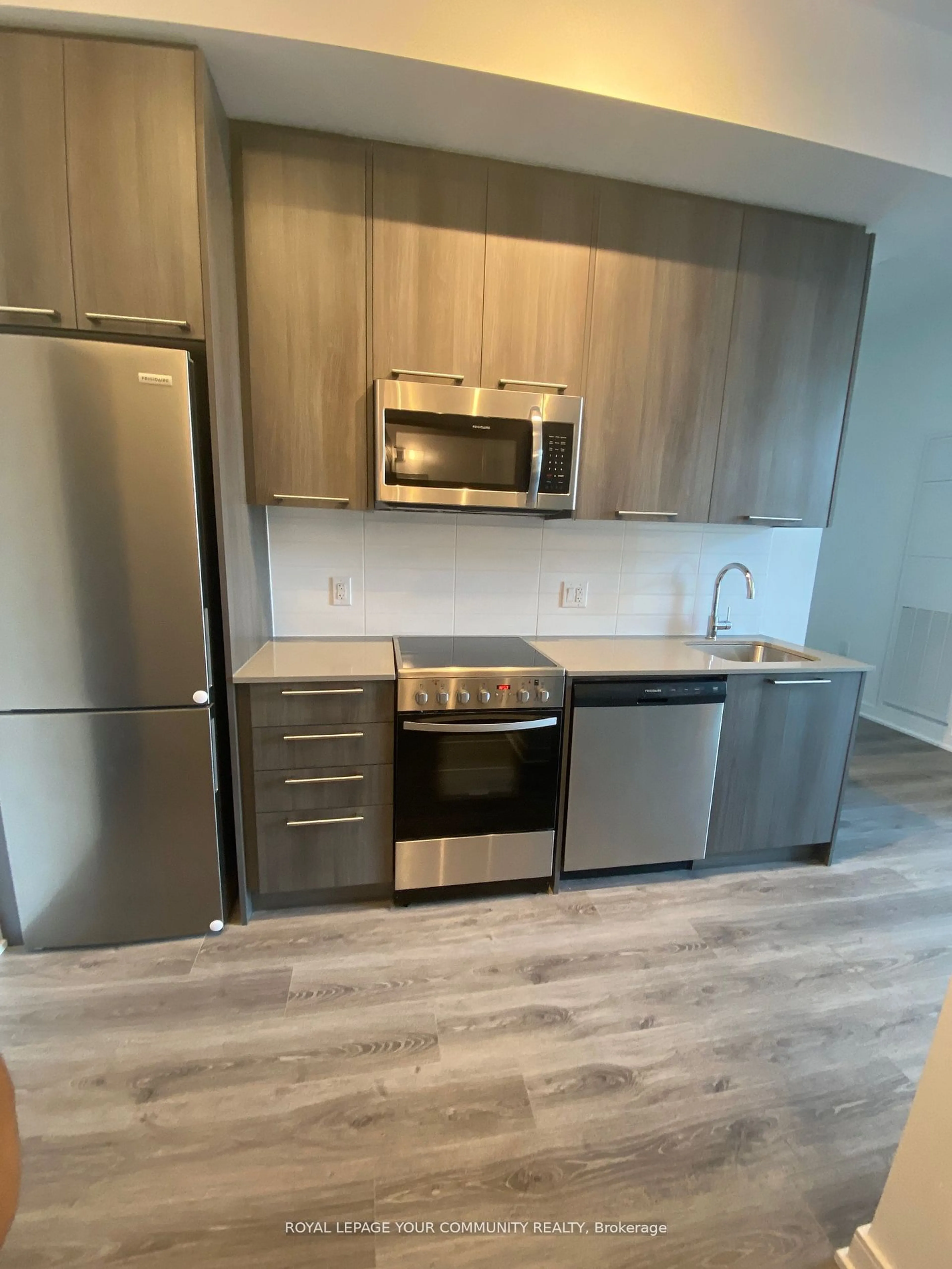 Standard kitchen, wood floors for 25 Neighbourhood Lane #103, Toronto Ontario M8Y 0C4