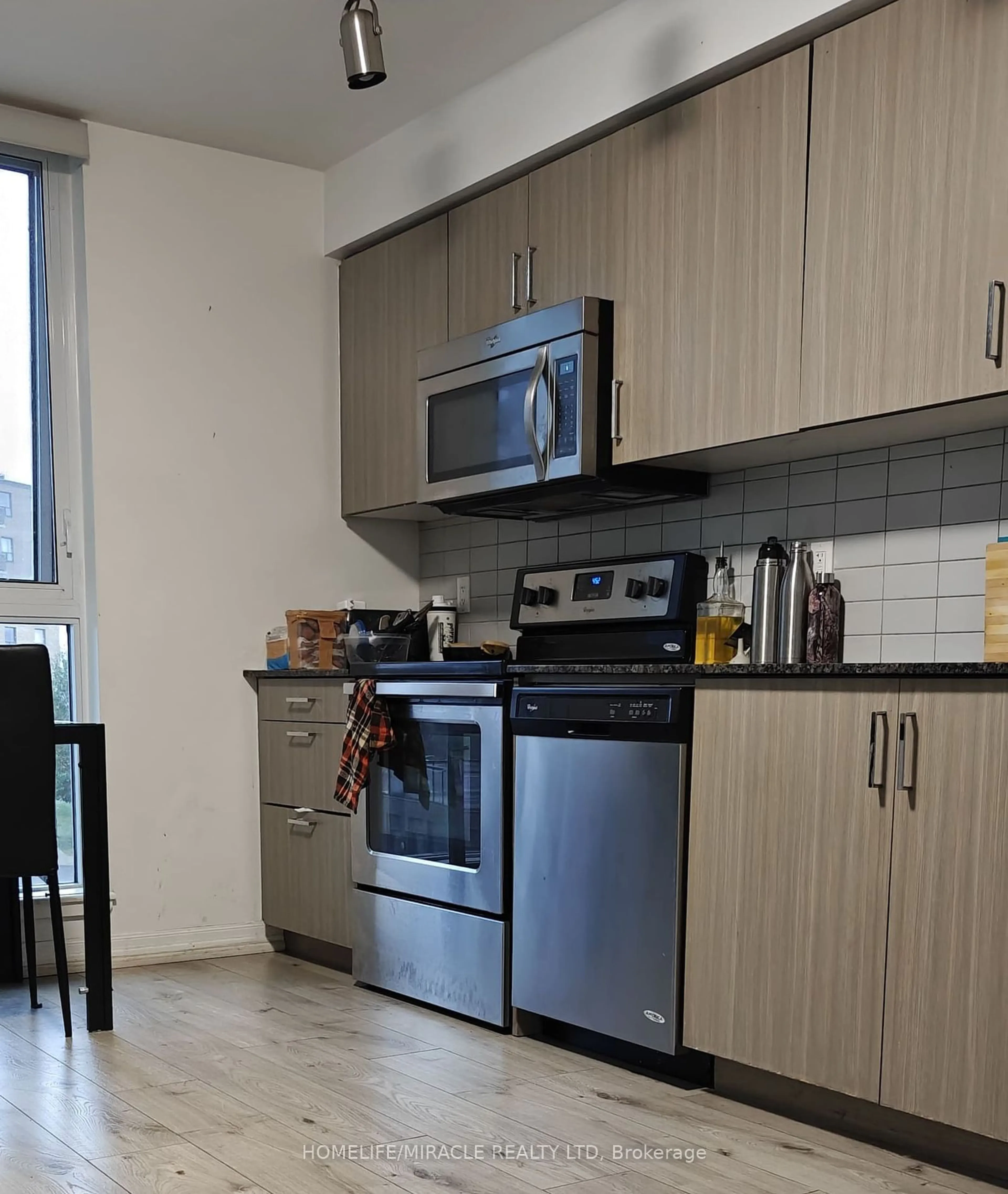 Standard kitchen, wood floors for 80 Esther Lorrie Dr #304, Toronto Ontario M9W 0C6