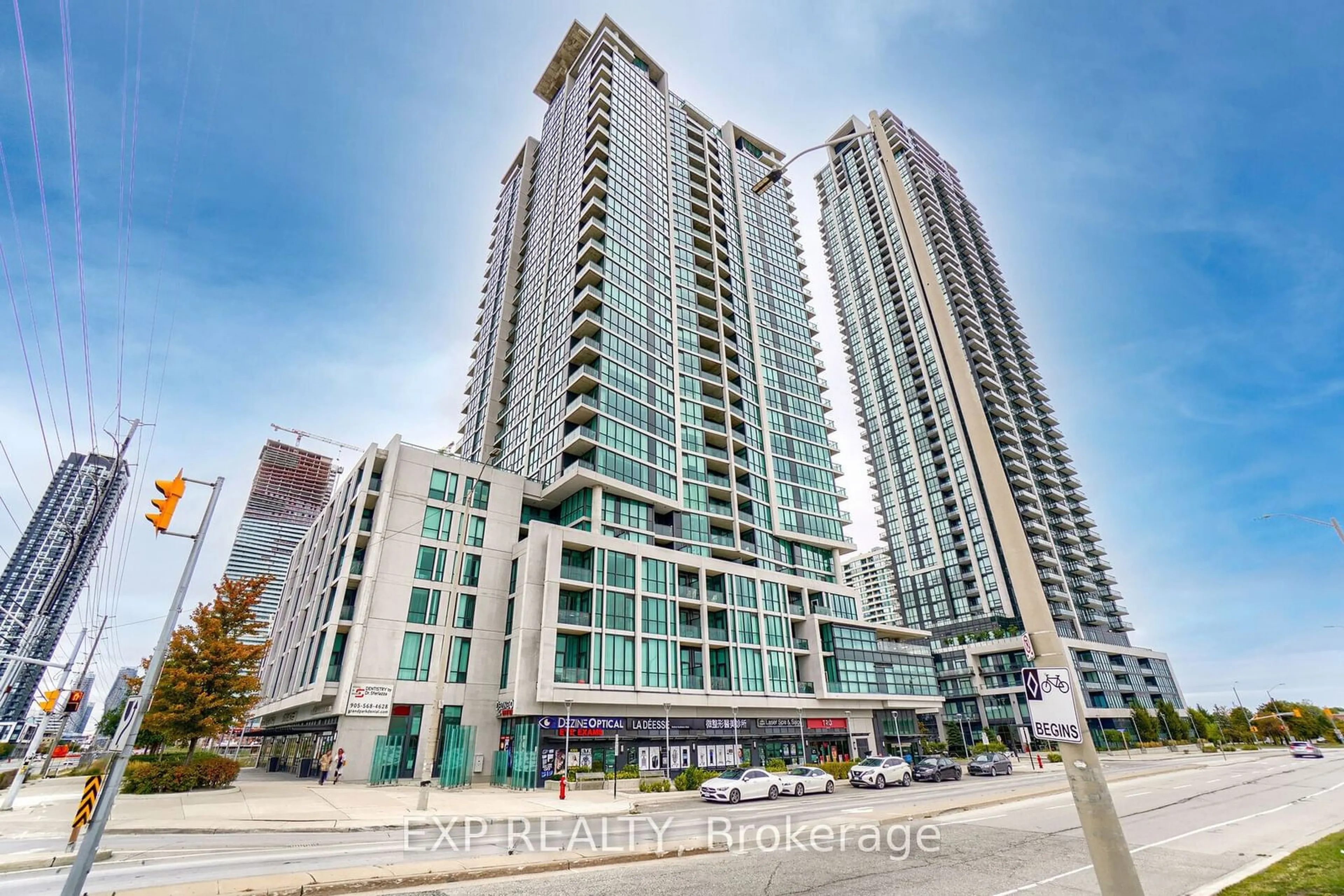 A pic from exterior of the house or condo, the front or back of building for 3985 Grand Park Dr #406, Mississauga Ontario L5B 0H8