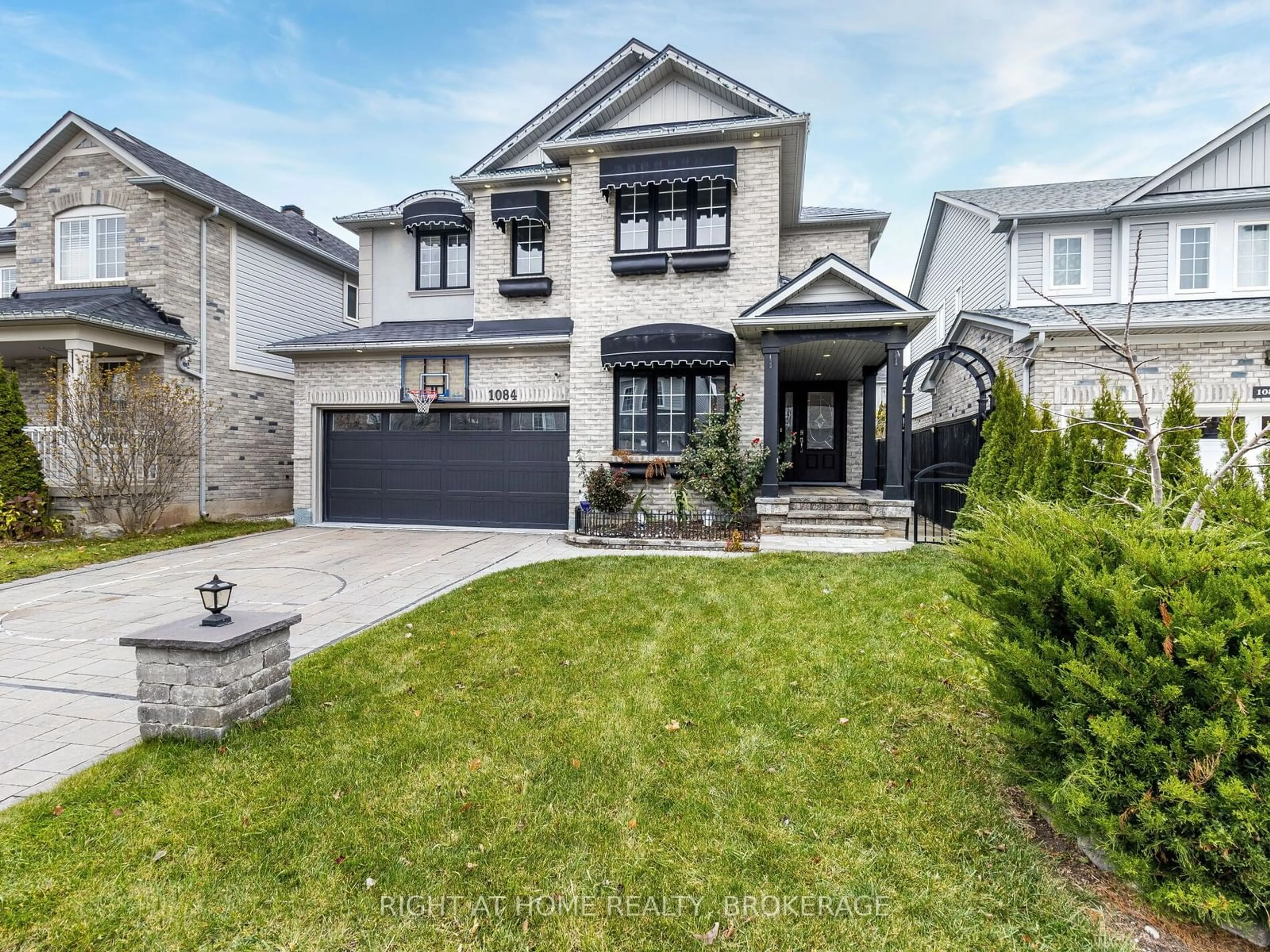 Frontside or backside of a home, the street view for 1084 Holdsworth Cres, Milton Ontario L9T 0C1