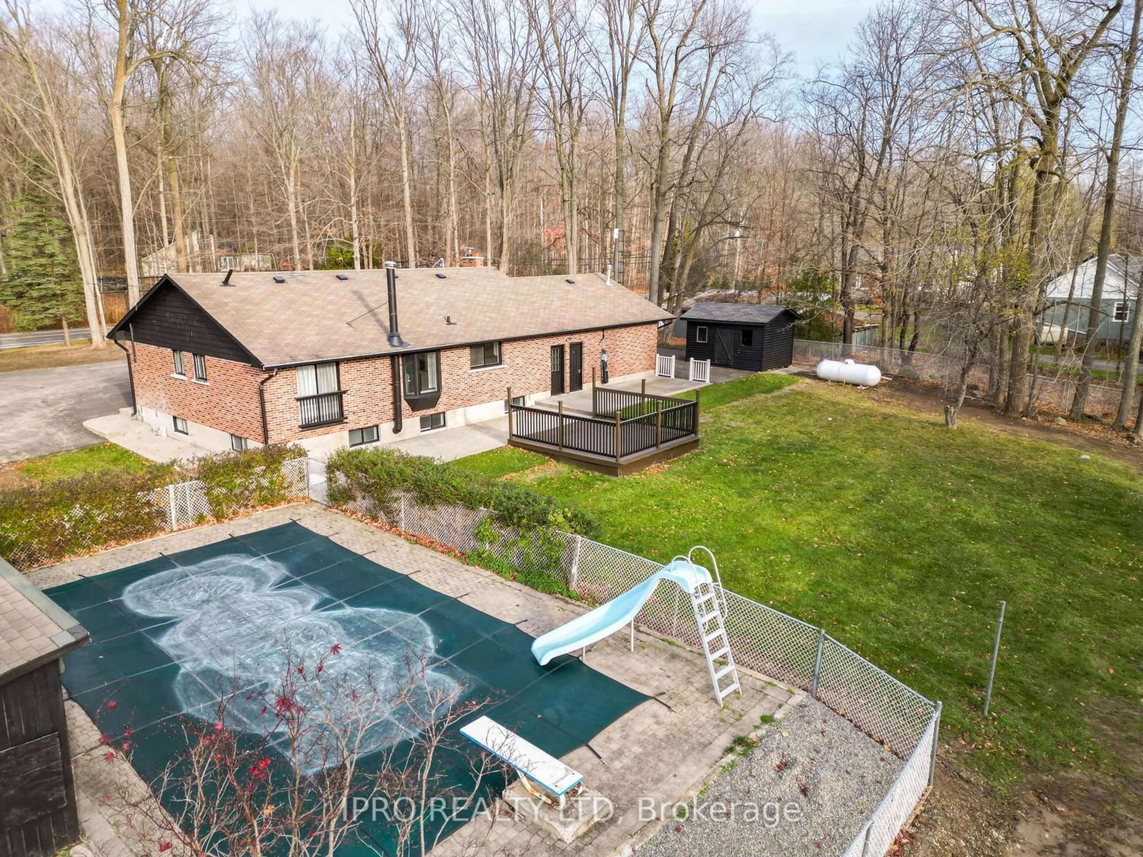 Frontside or backside of a home, the fenced backyard for 1281 Olde Base Line Rd, Caledon Ontario L7C 0K5