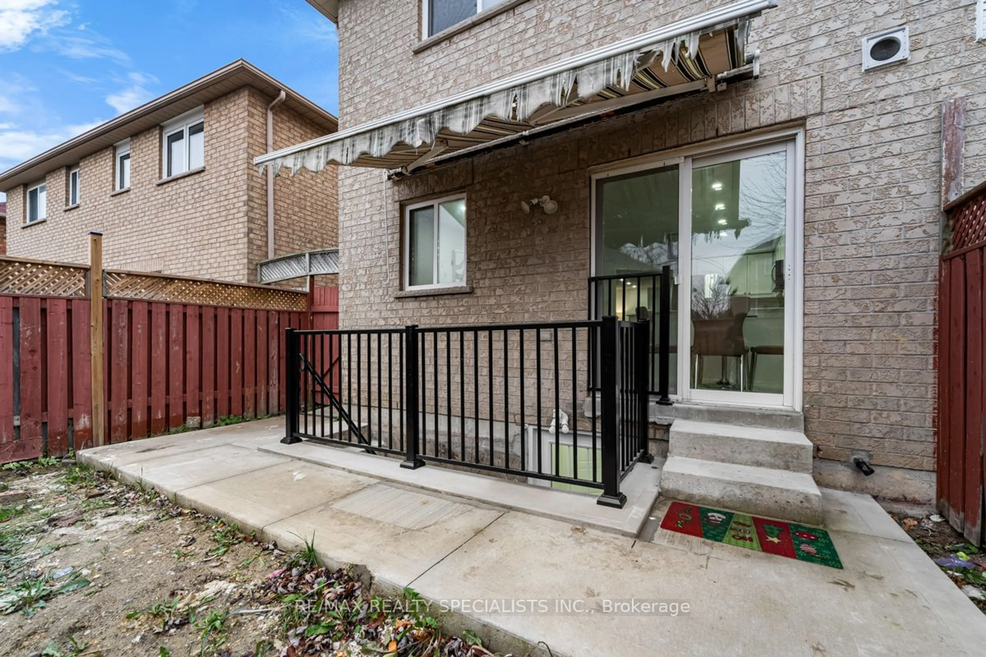 Patio, the fenced backyard for 63 Weather Vane Lane, Brampton Ontario L6X 4R4