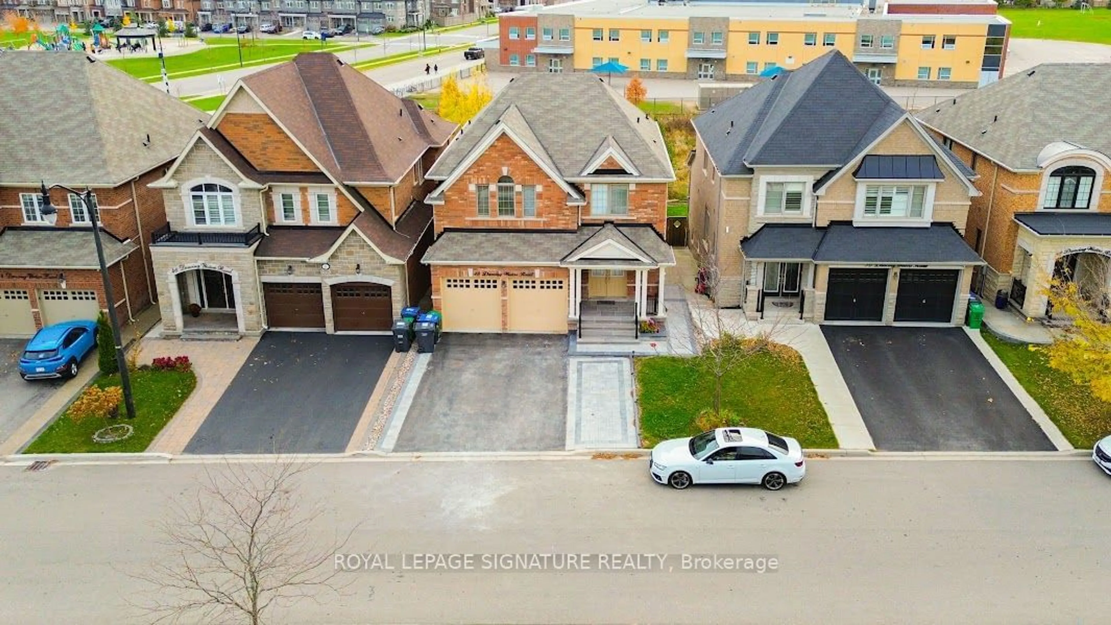 A pic from exterior of the house or condo, the street view for 48 Dancing Waters Rd, Brampton Ontario L6Y 0L3