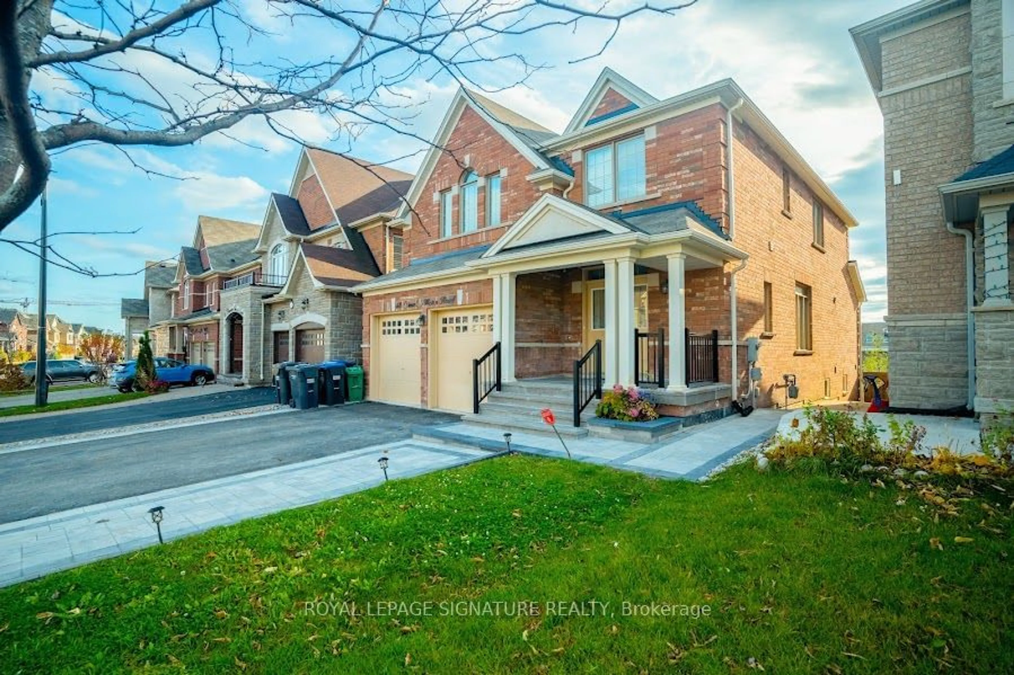 Home with brick exterior material for 48 Dancing Waters Rd, Brampton Ontario L6Y 0L3