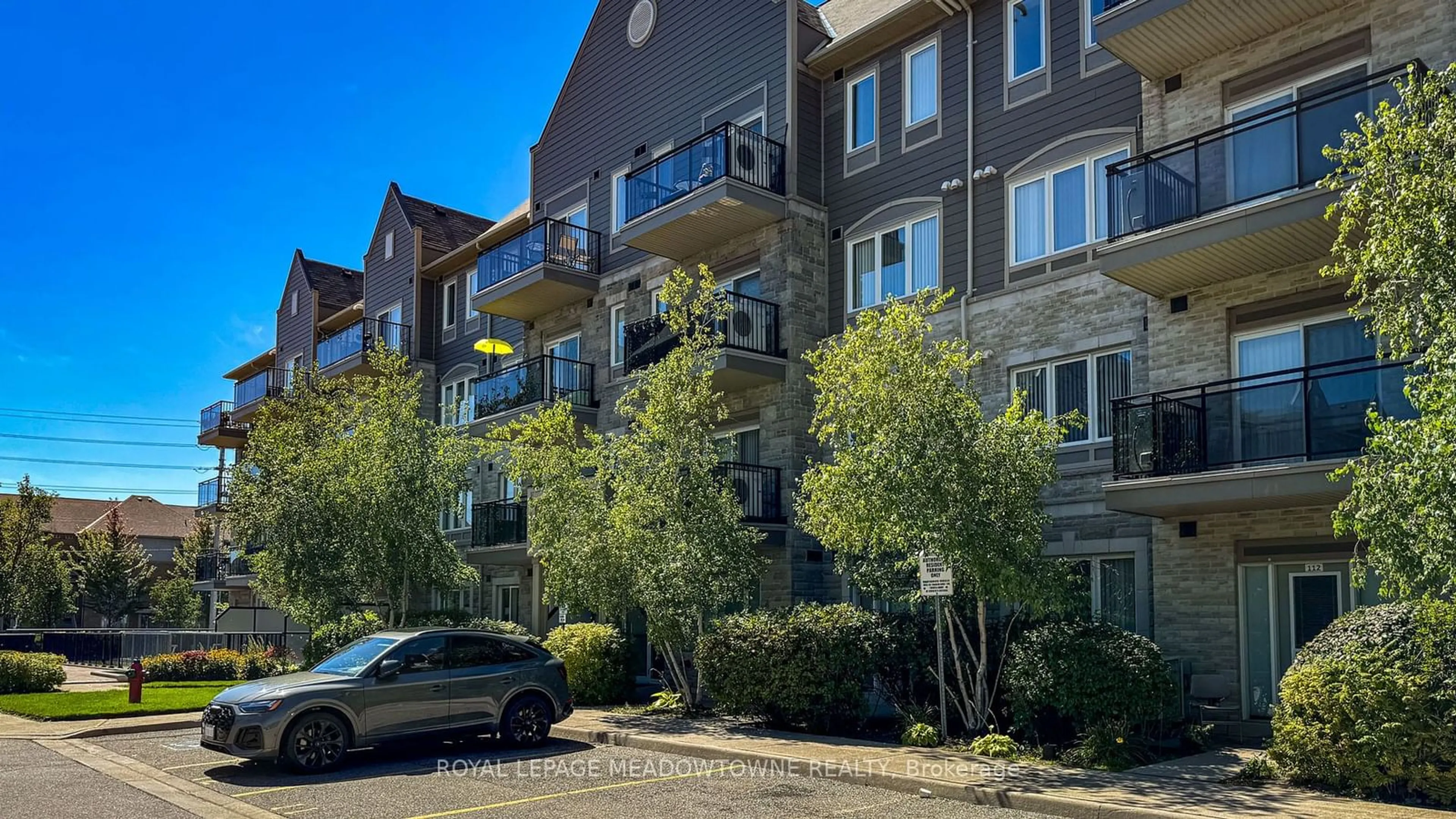 A pic from exterior of the house or condo, the front or back of building for 5705 Long Valley Rd #309, Mississauga Ontario L5M 0M3