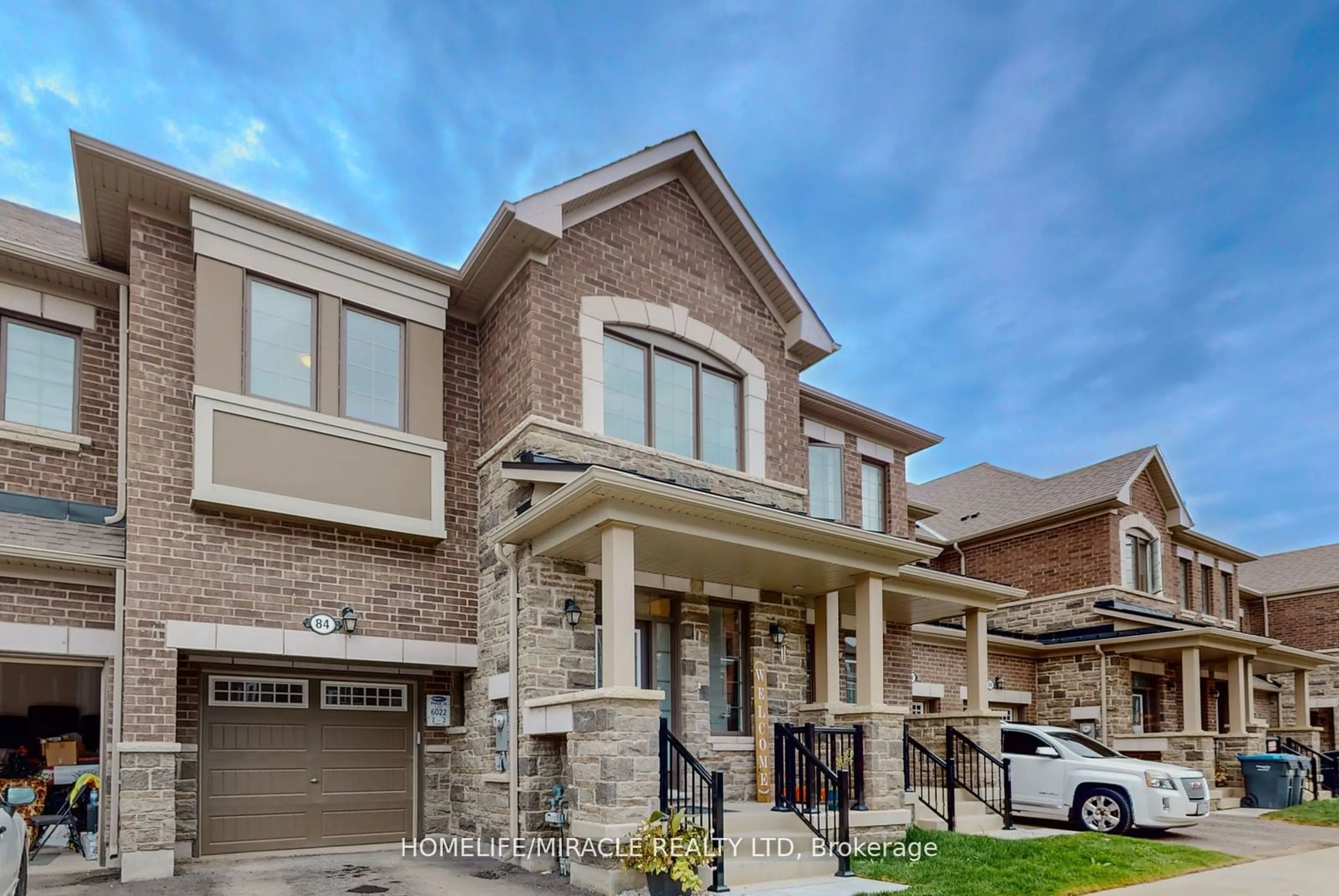 Home with brick exterior material for 84 Keppel Circ, Brampton Ontario L7A 5K9