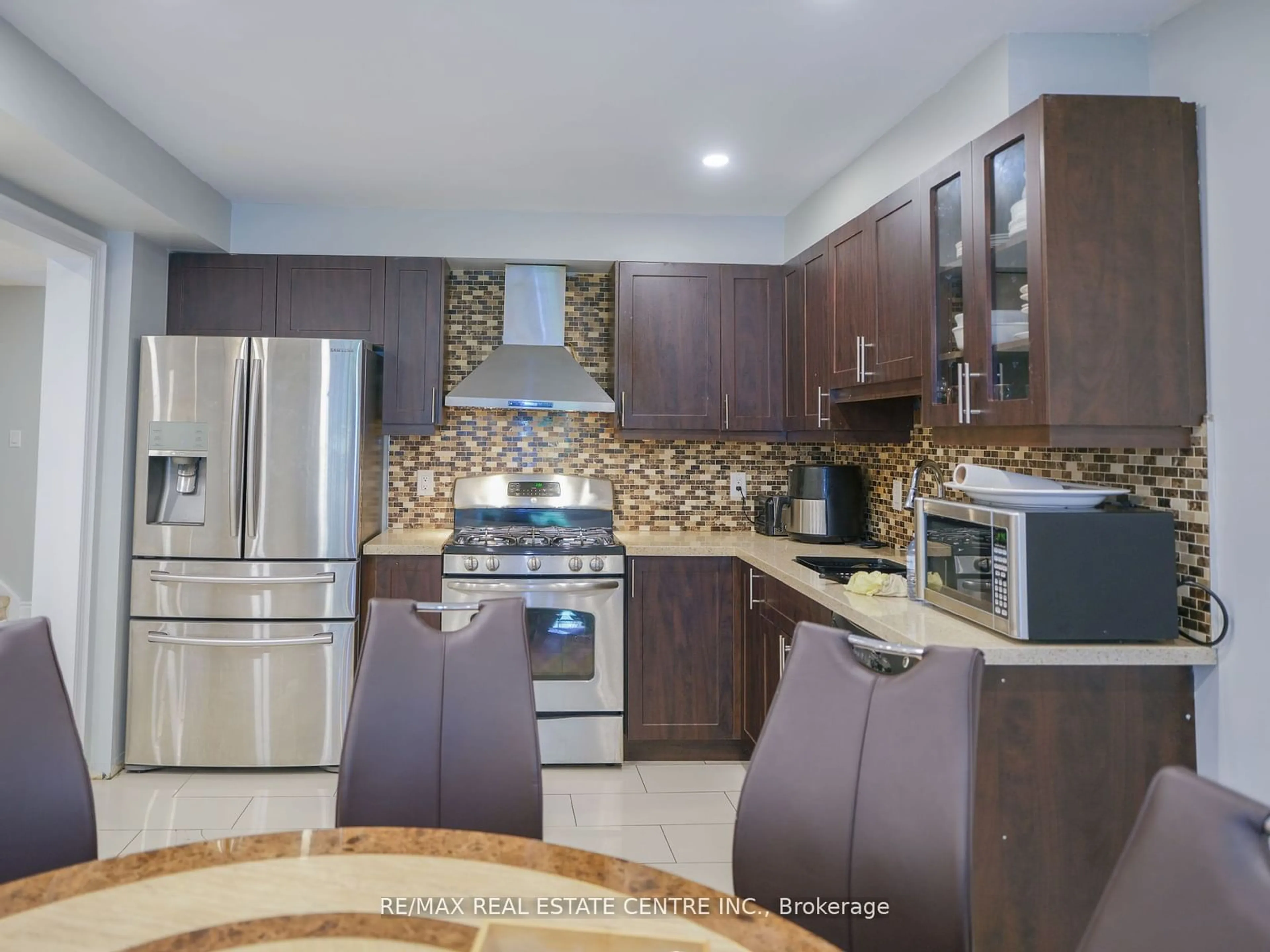 Contemporary kitchen, ceramic floors for 261 Hollymount Dr, Mississauga Ontario L5R 3P8