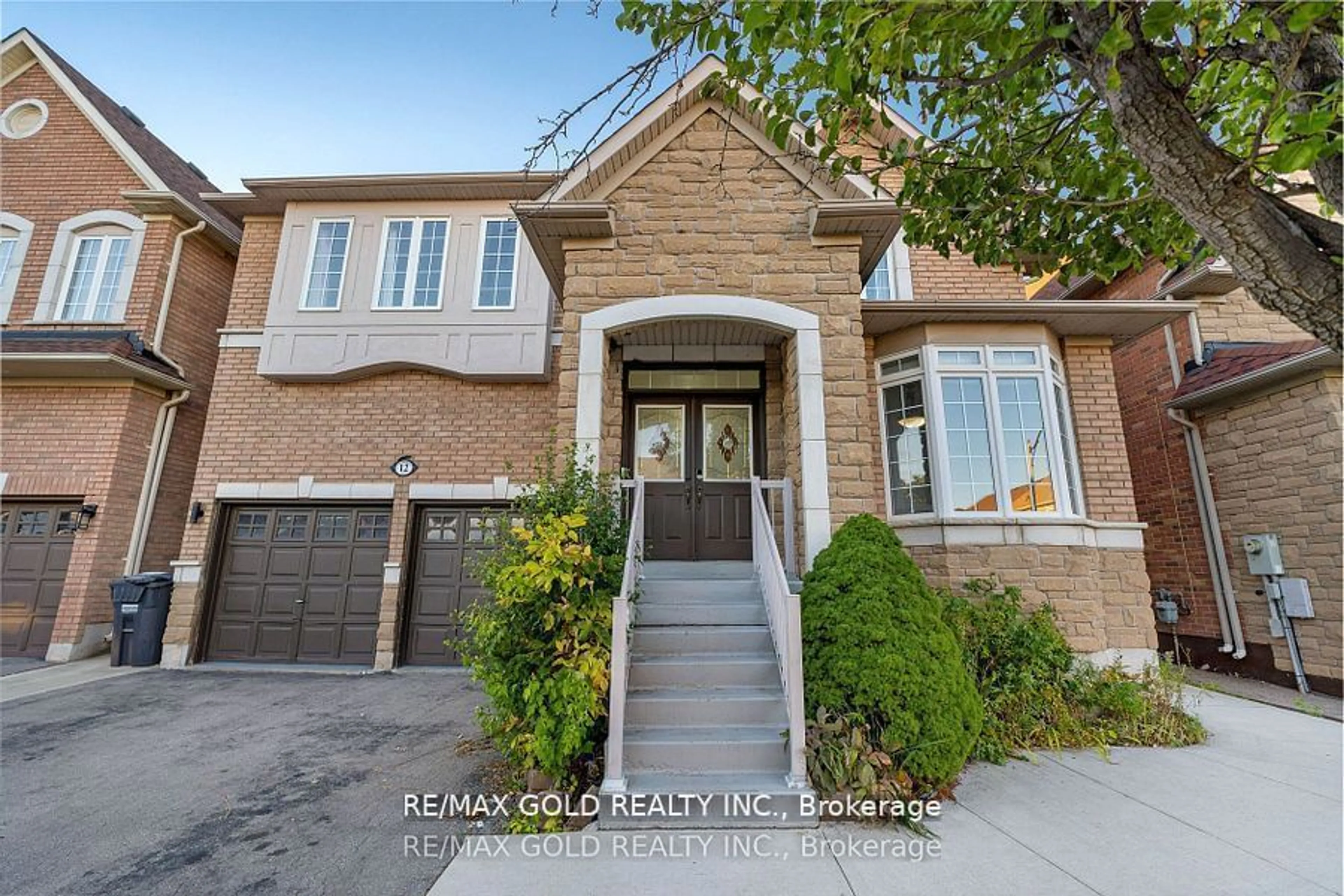 Home with brick exterior material for 12 Castle Mountain Dr, Brampton Ontario L6R 2Y1