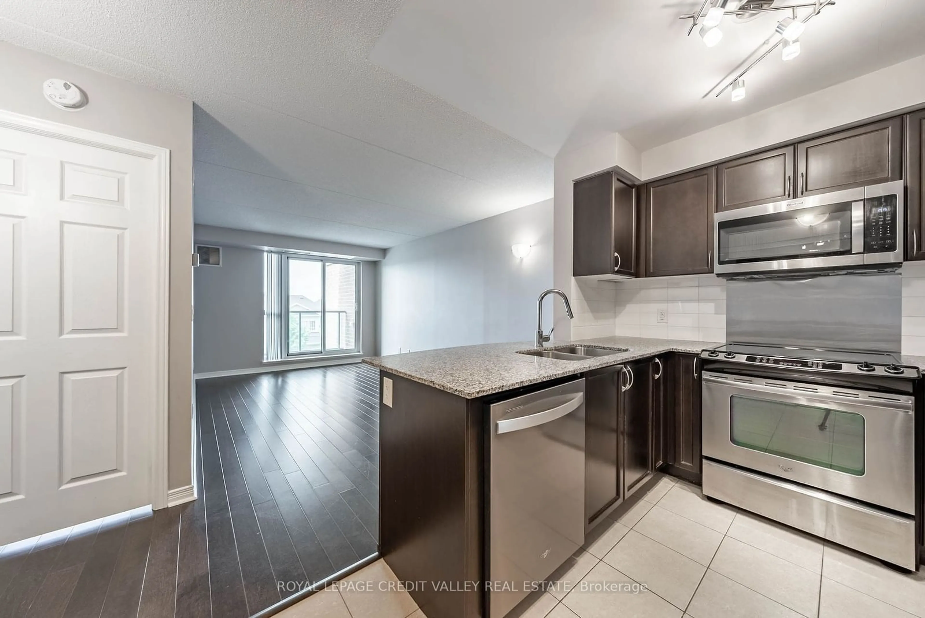 Open concept kitchen for 60 Via Rosedale #317, Brampton Ontario L6R 3X6