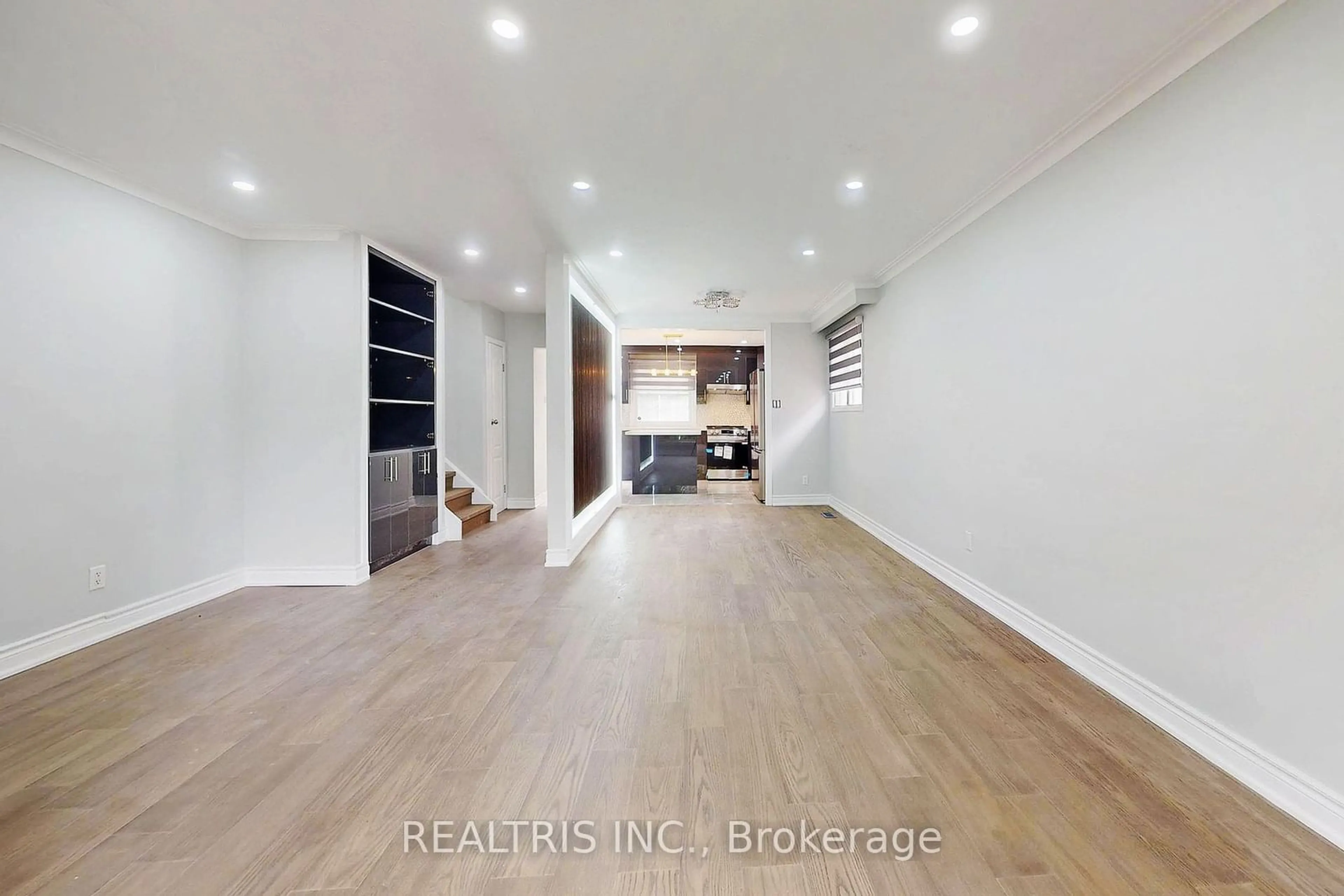 A pic of a room, wood floors for 36 Tealham Dr, Toronto Ontario M9V 3T6