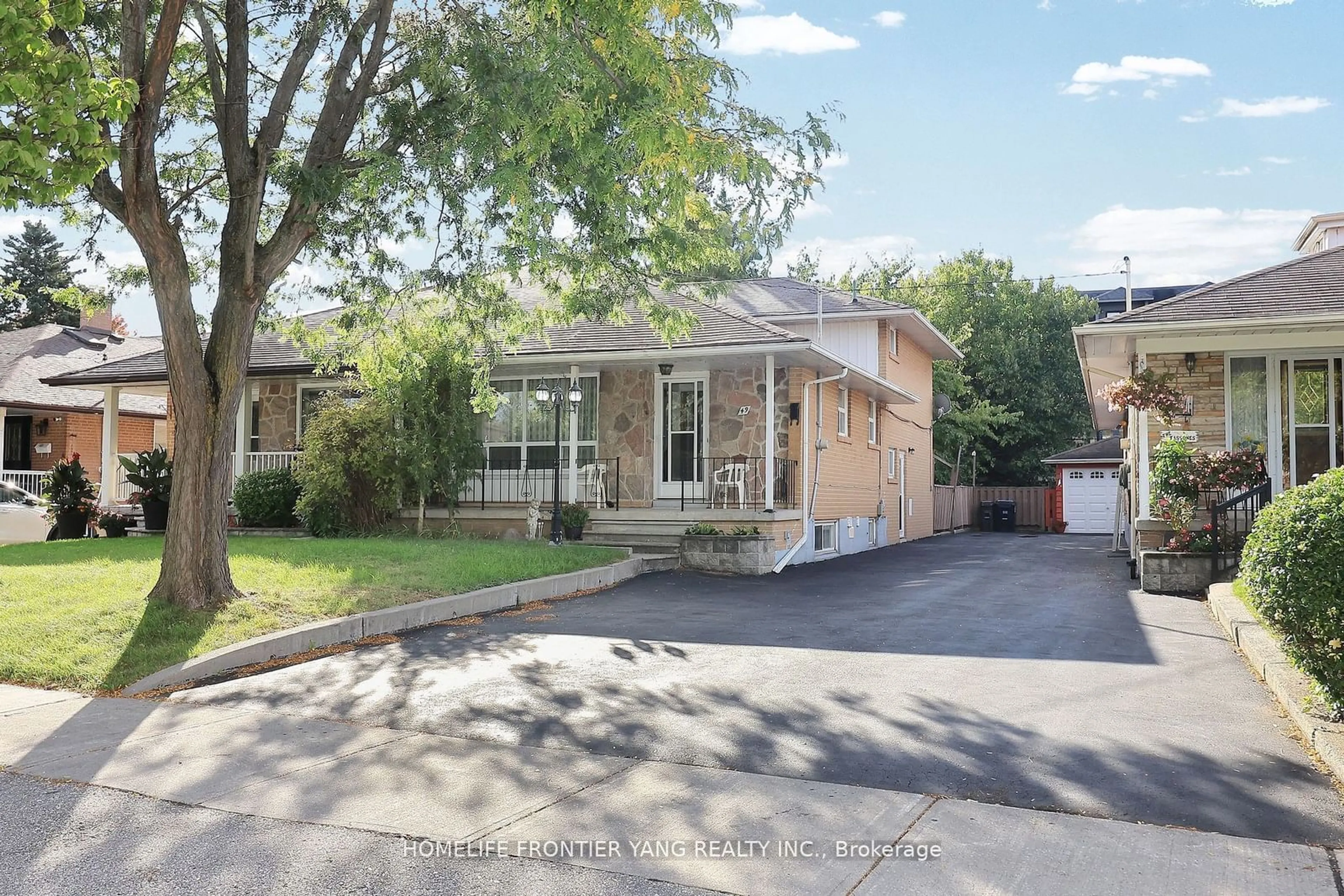 Frontside or backside of a home, the street view for 49 Graystone Gdns, Toronto Ontario M8Z 3C2