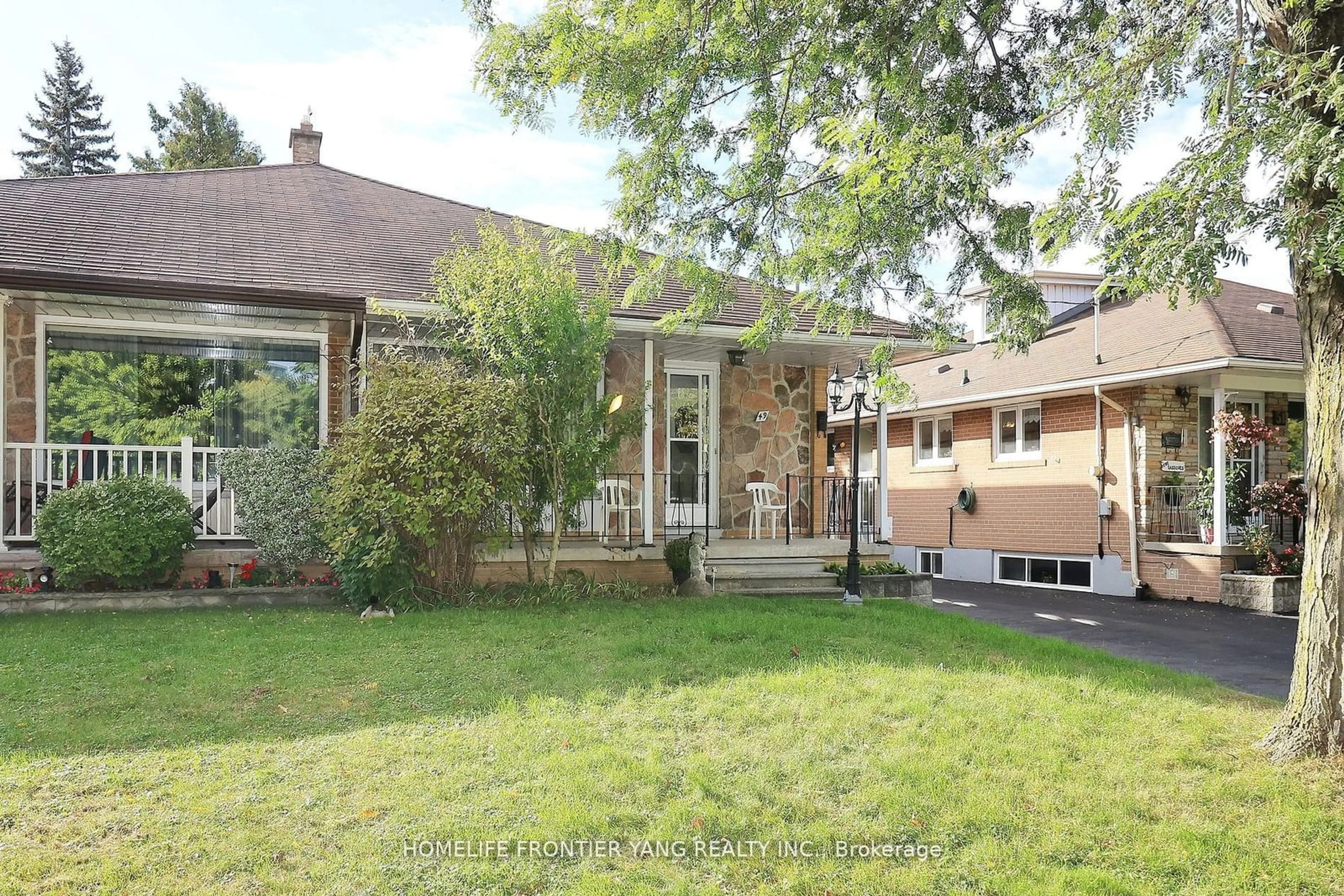 Frontside or backside of a home, the fenced backyard for 49 Graystone Gdns, Toronto Ontario M8Z 3C2