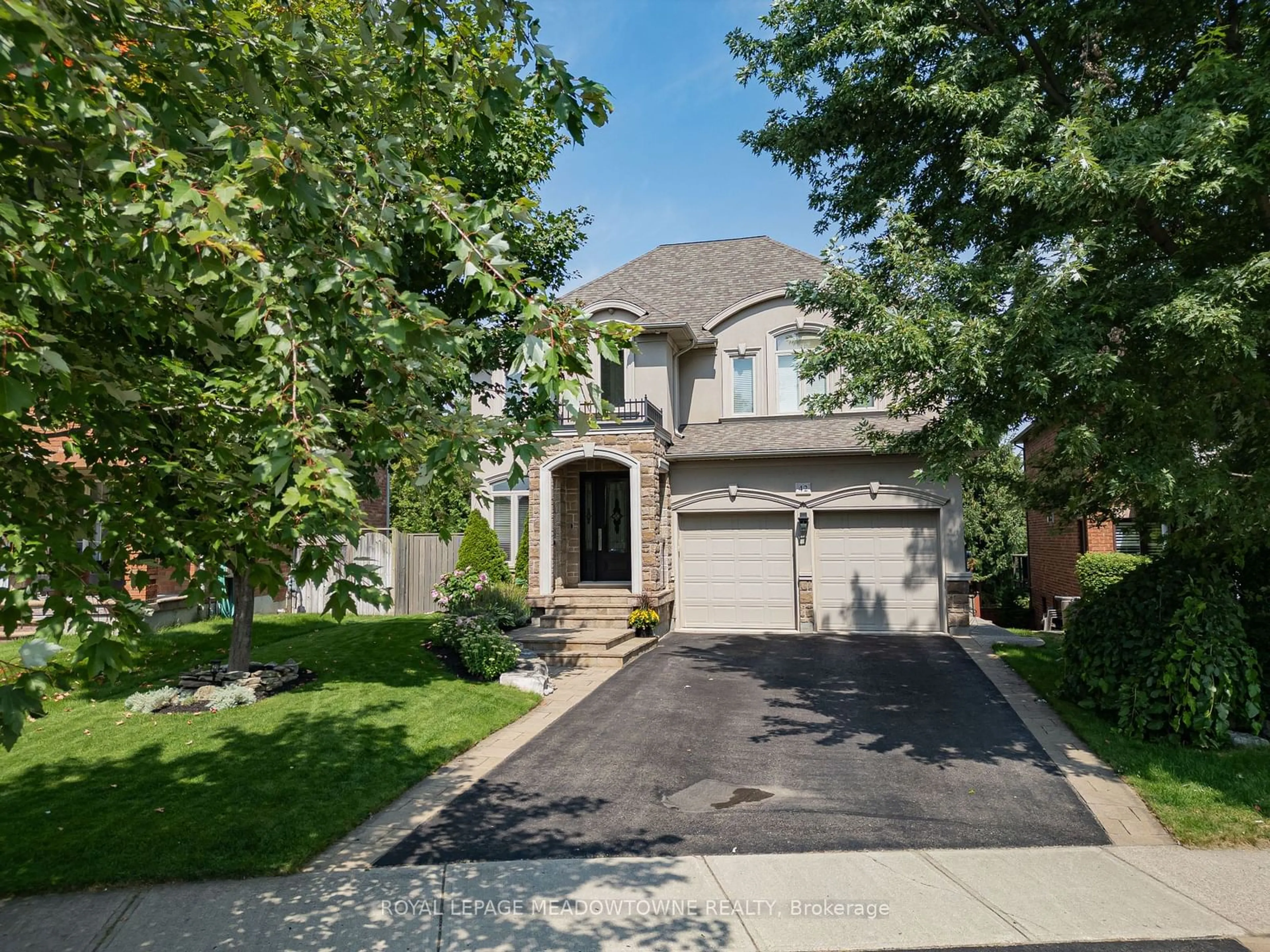 Frontside or backside of a home, the street view for 42 Oak St, Halton Hills Ontario L7G 5W8