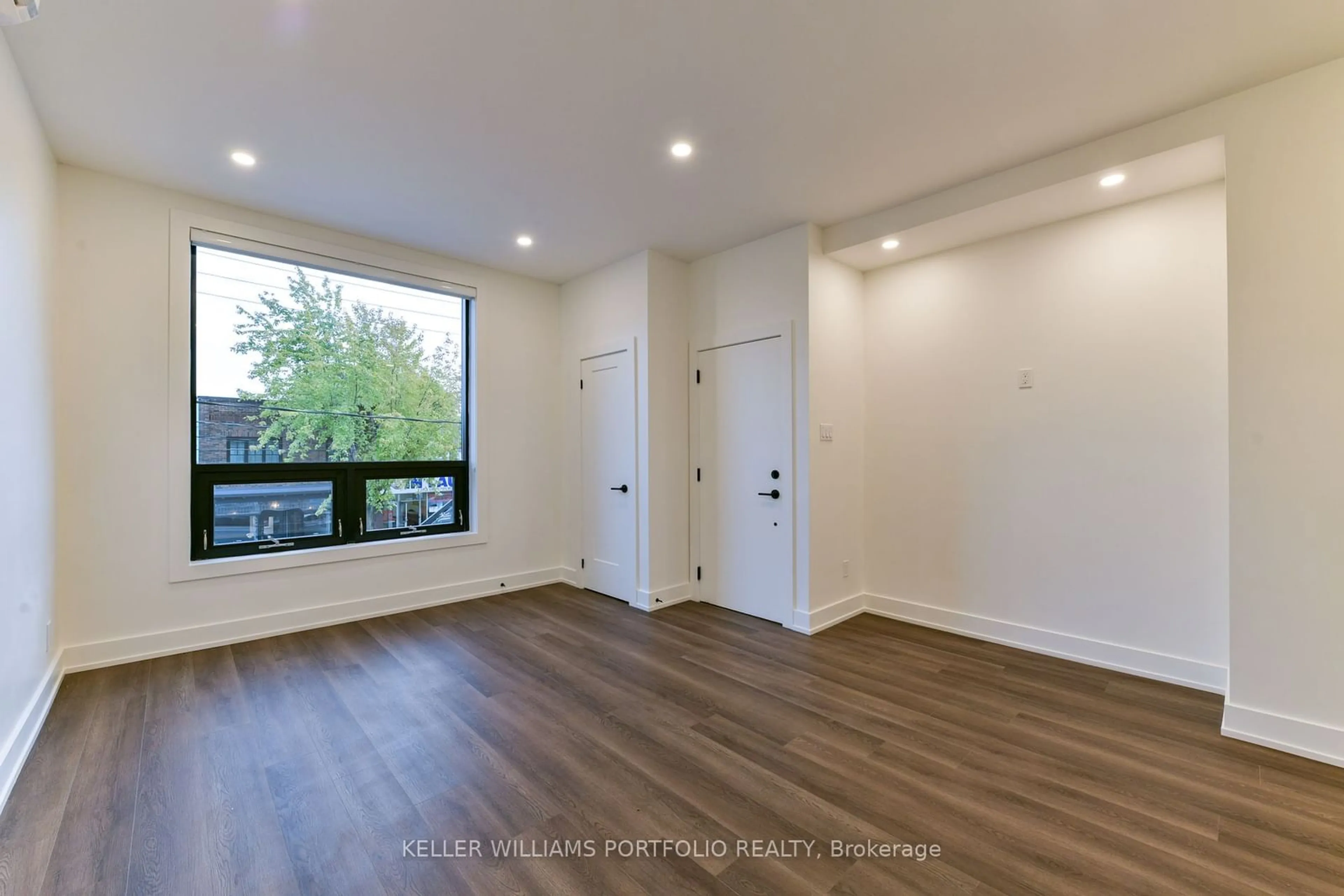 A pic of a room, wood floors for 1250 Davenport Rd, Toronto Ontario M6H 2G9