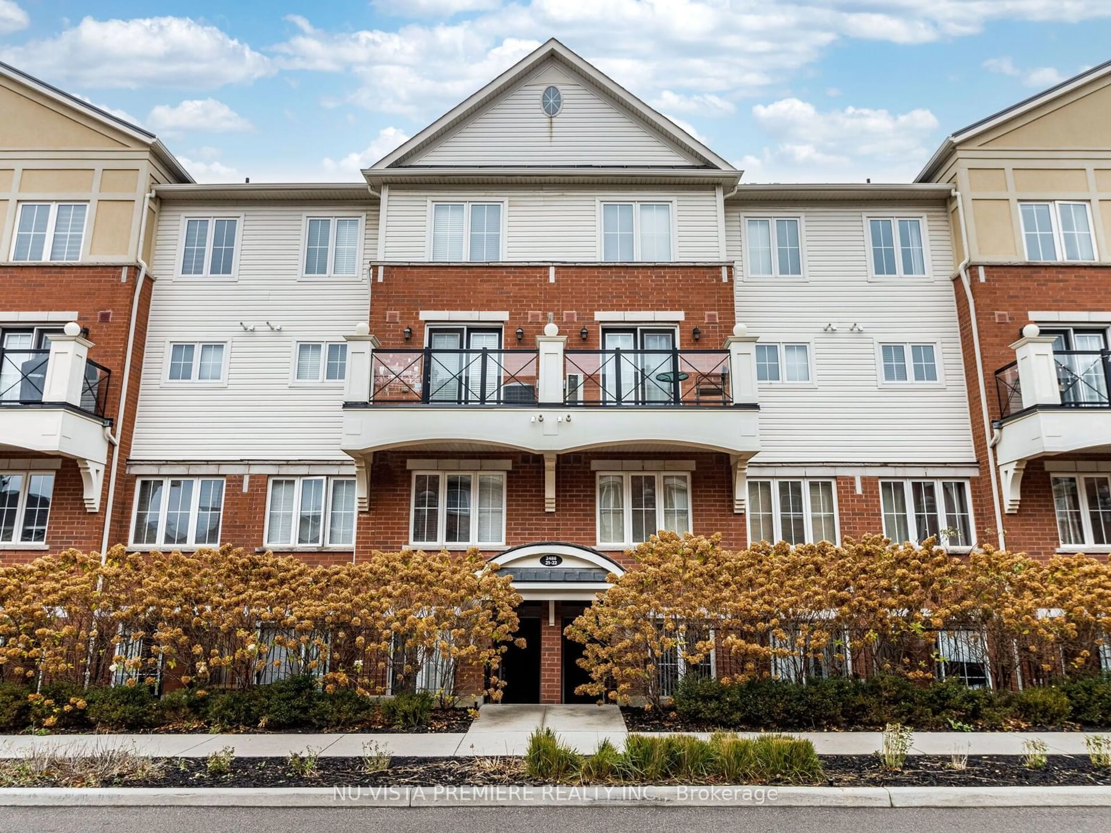 A pic from exterior of the house or condo, the front or back of building for 2488 Post Rd #22, Oakville Ontario L6H 0K1