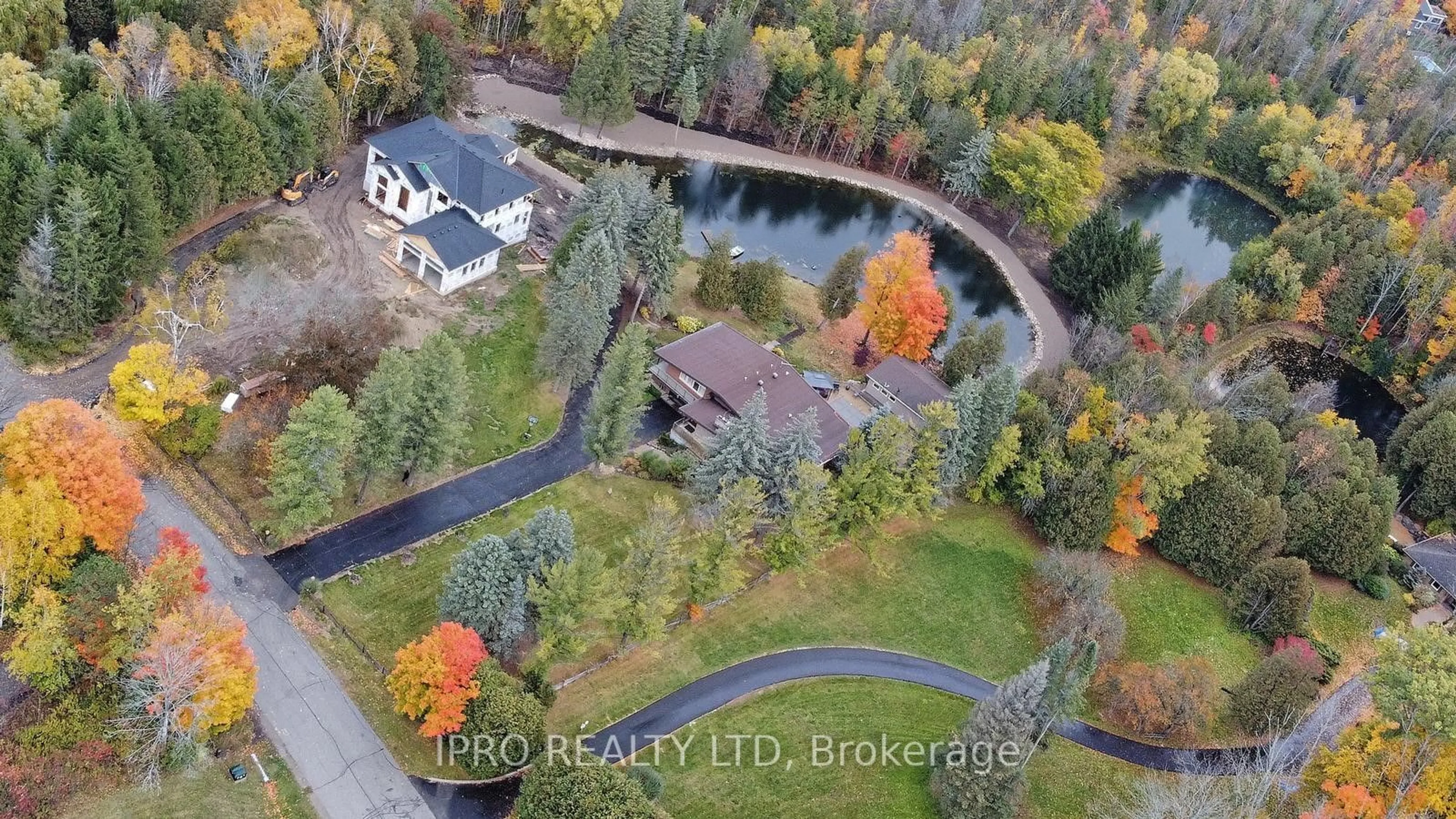 Frontside or backside of a home, the fenced backyard for 16 Cedar Dr, Caledon Ontario L7K 1H6