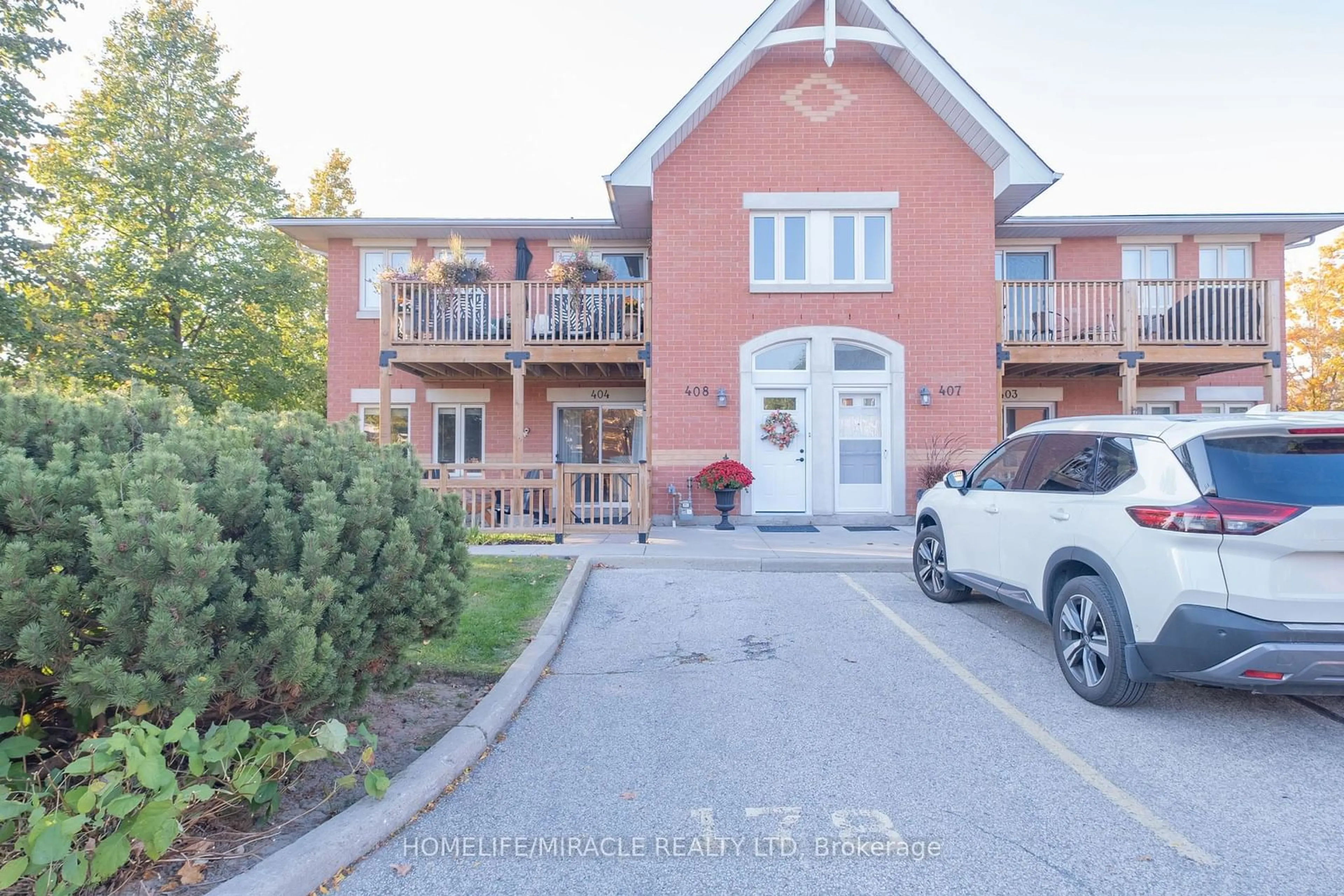 A pic from exterior of the house or condo, the street view for 4140 Foxwood Dr #404, Burlington Ontario L7M 4R4