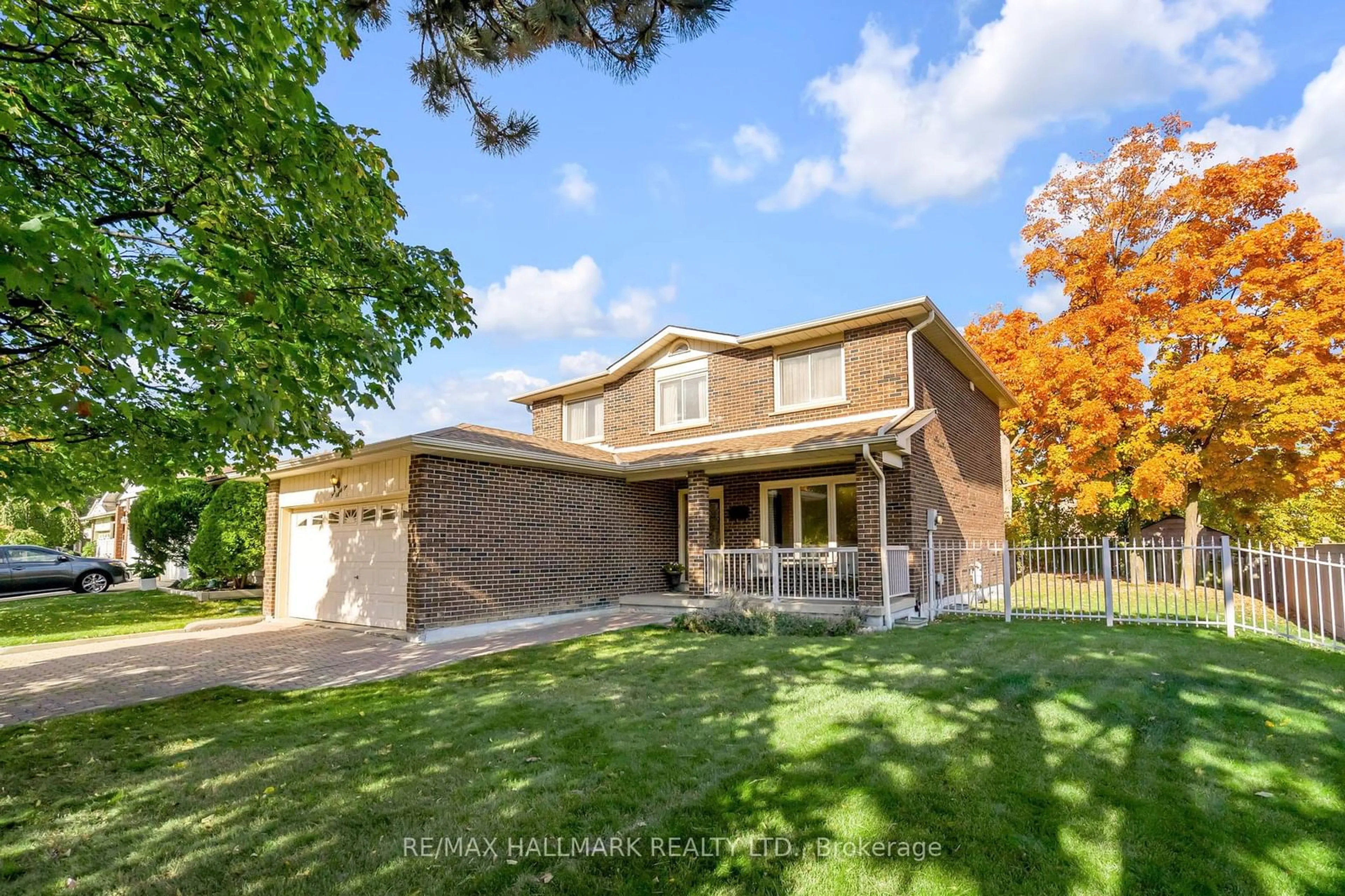 Frontside or backside of a home, the fenced backyard for 281 Chalfield Lane, Mississauga Ontario L4Z 1L1