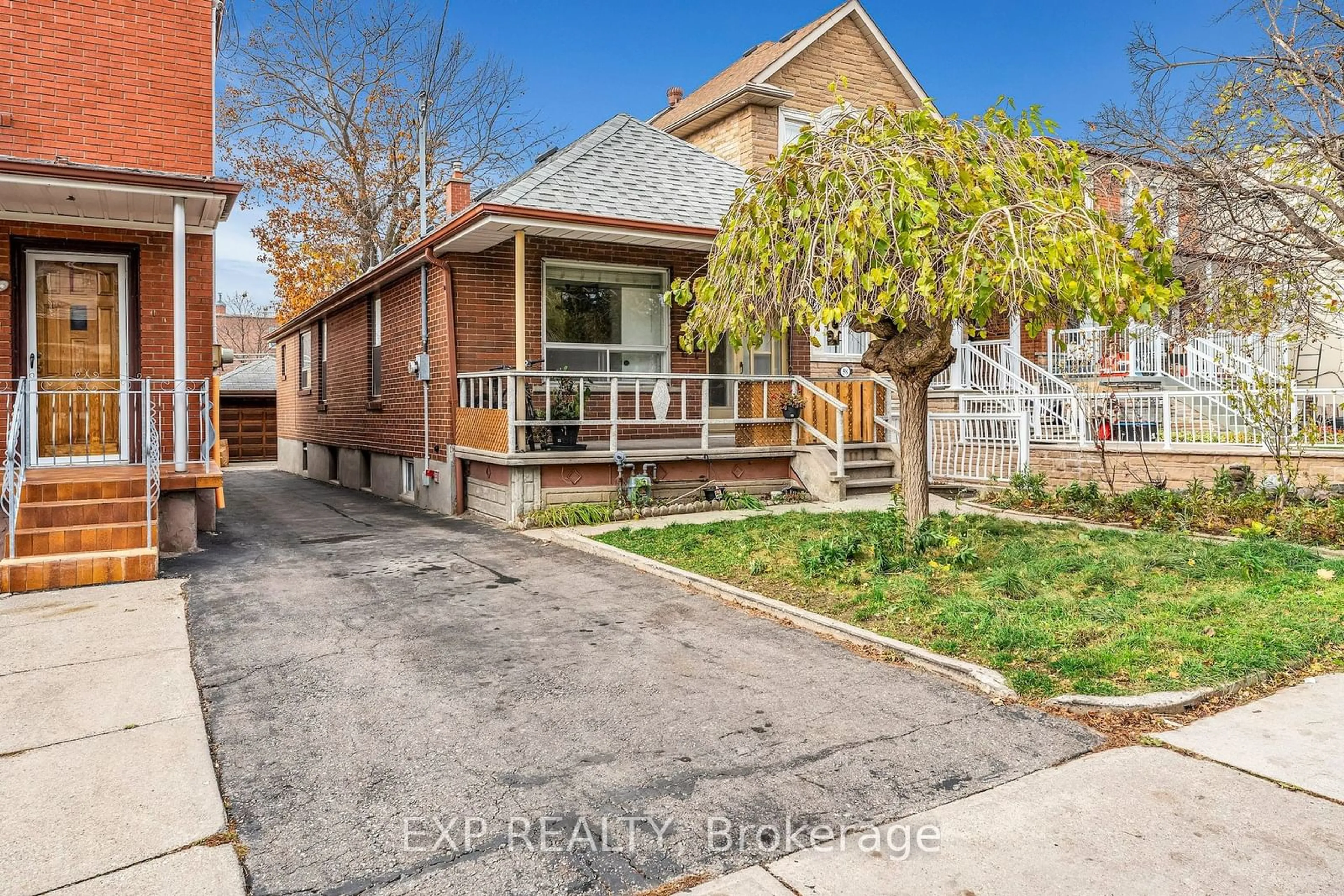 Frontside or backside of a home, the fenced backyard for 56 Branstone Rd, Toronto Ontario M6E 4E4