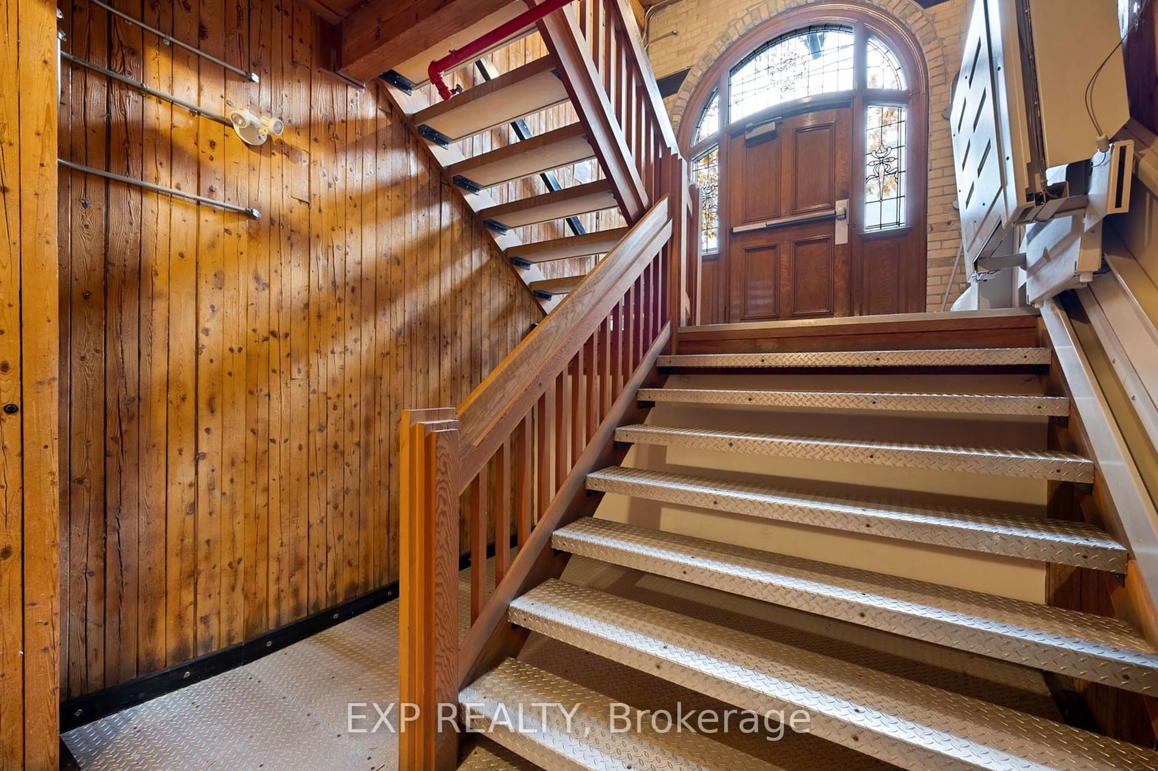 Indoor entryway, wood floors for 371 Wallace Ave #2, Toronto Ontario M6P 3N8