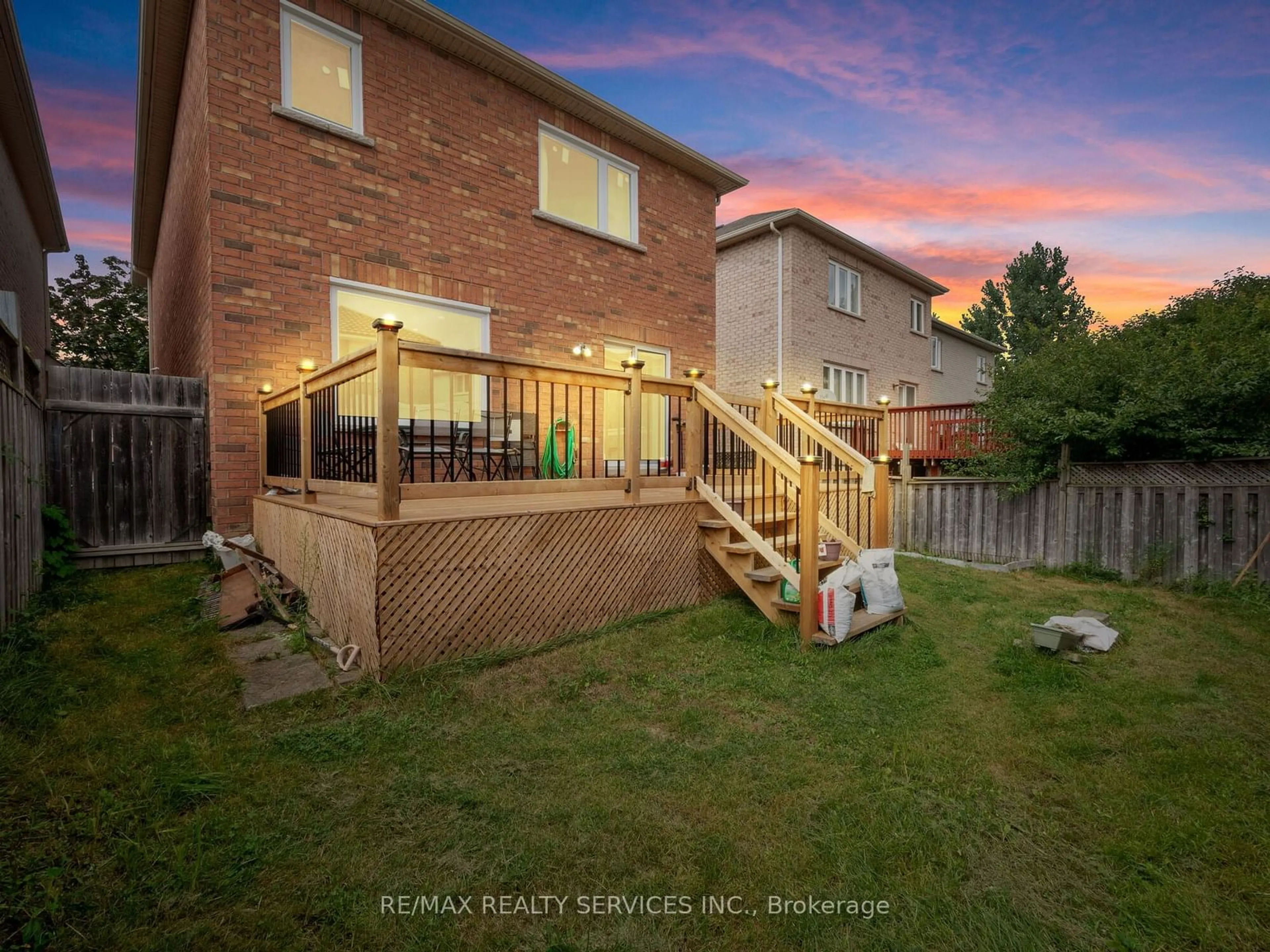 Frontside or backside of a home, the fenced backyard for 33 Echoridge Dr, Brampton Ontario L7A 3K8