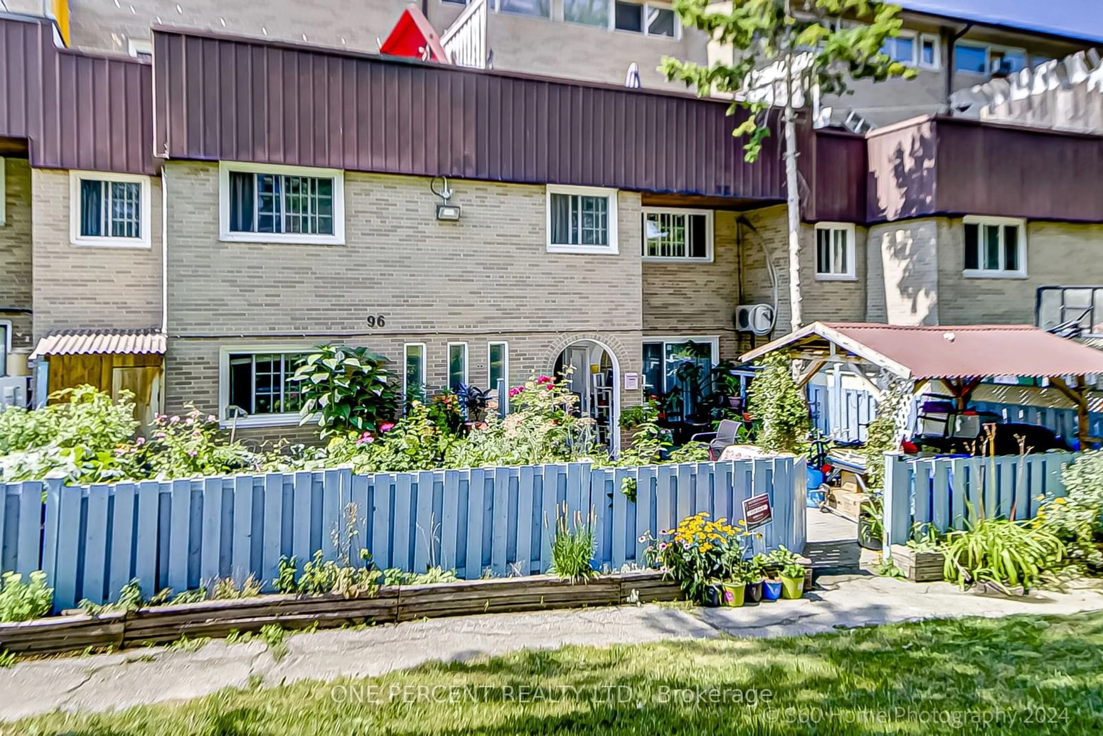 A pic from exterior of the house or condo, the fenced backyard for 14 London Green Crt #96, Toronto Ontario M3N 1K2