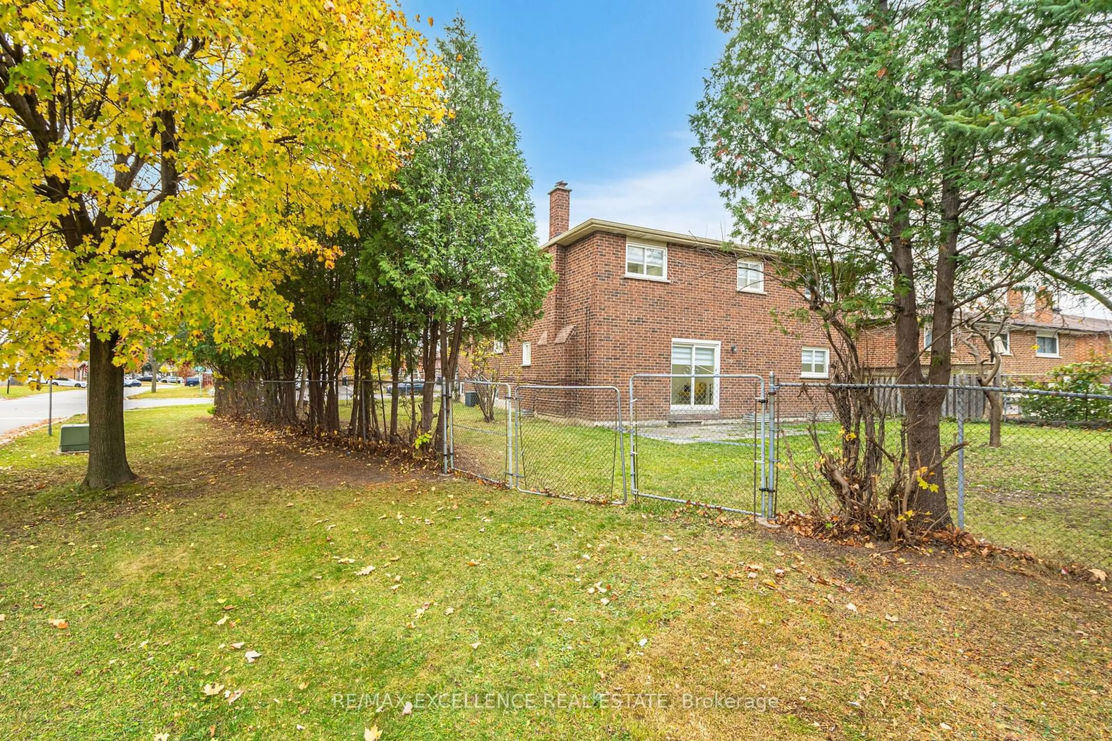 A pic from exterior of the house or condo, the fenced backyard for 45 Maitland St, Brampton Ontario L6S 3B4