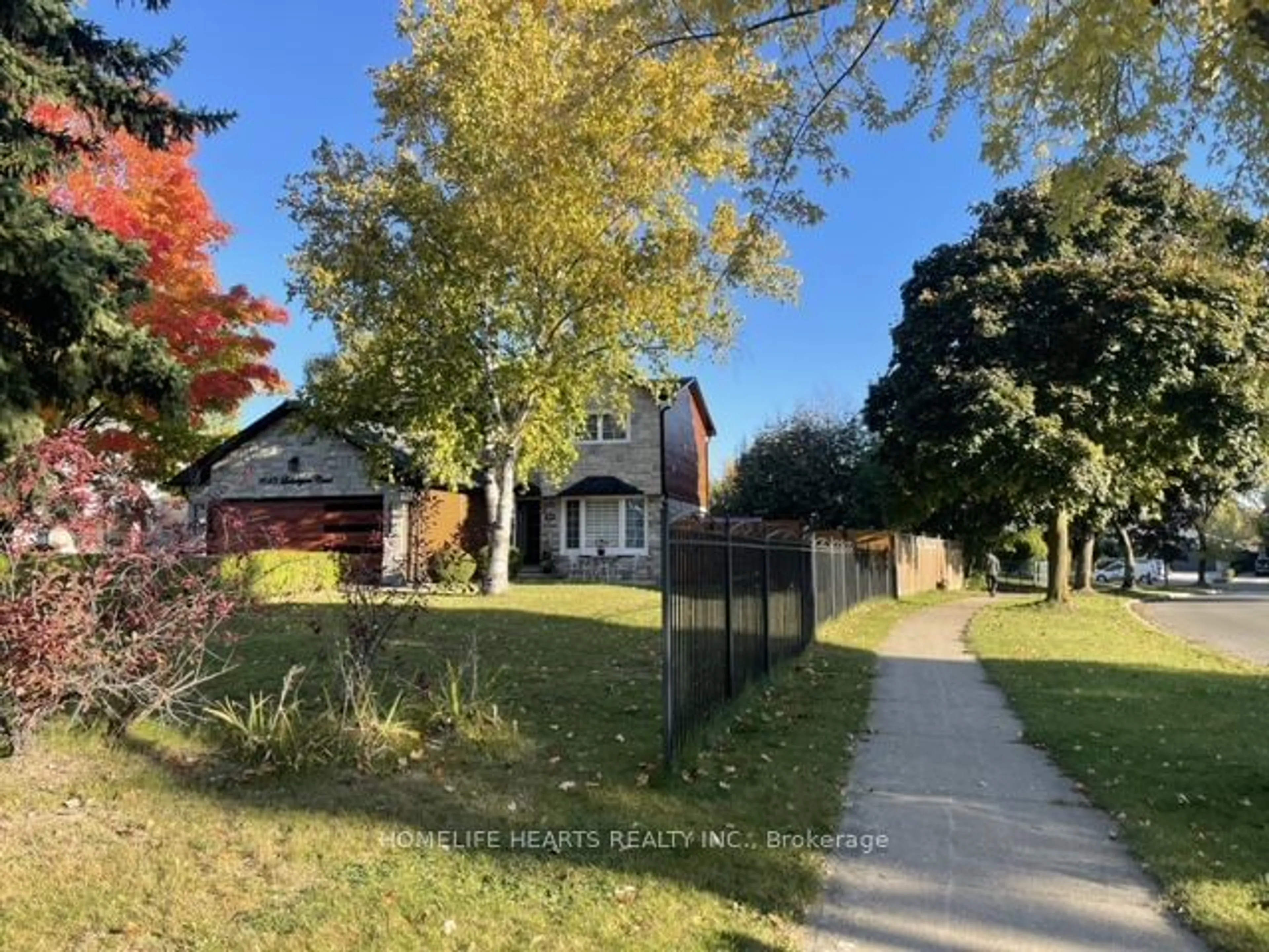 Frontside or backside of a home, the fenced backyard for 7643 Lohengrin Crt, Mississauga Ontario L4T 3J1